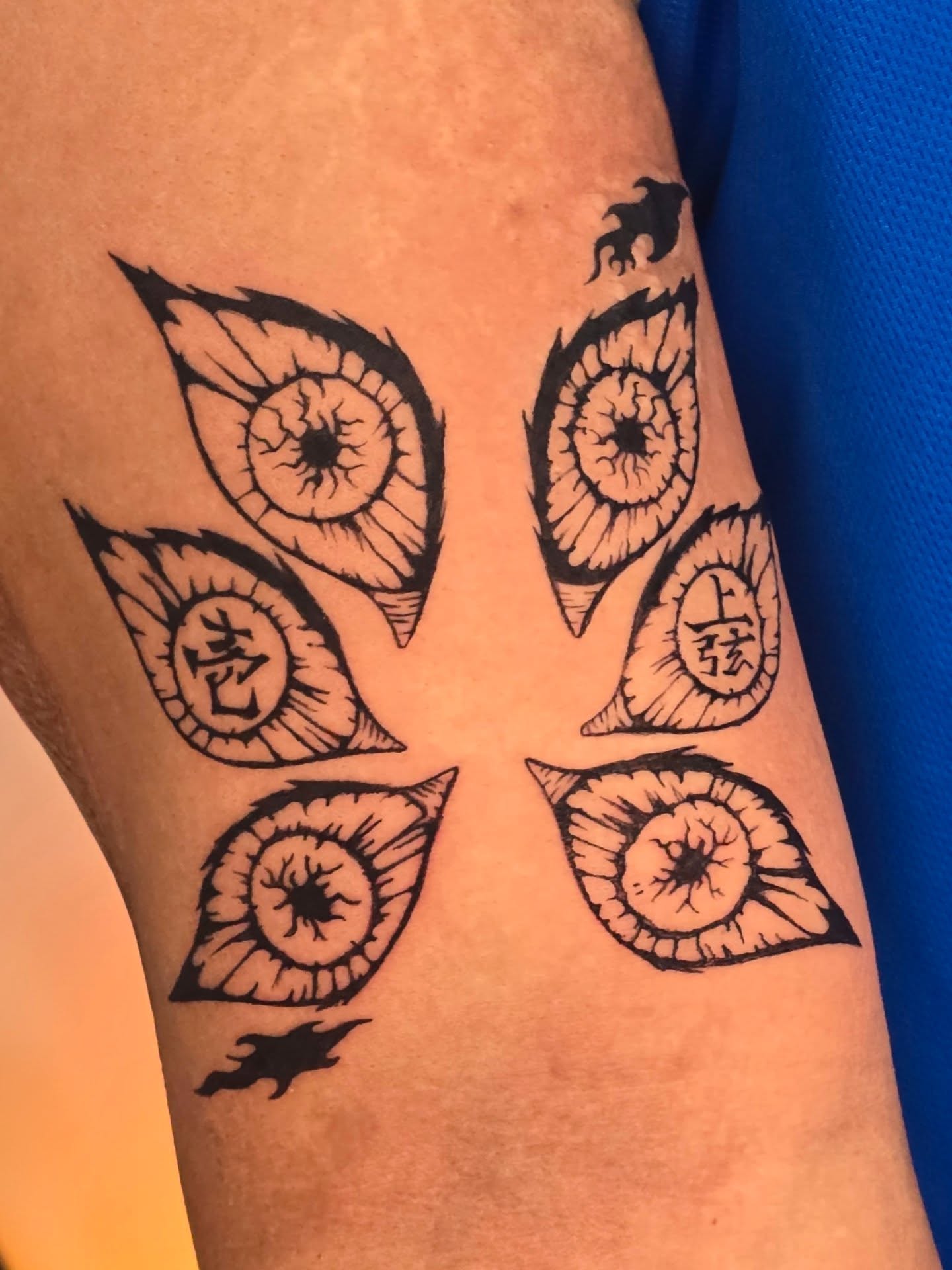 Eye black and grey tattoo on the forearm by Scribbles (Teala René), Charlotte, North Carolina