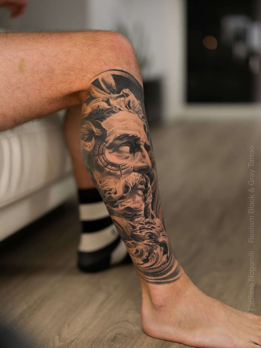 Tattoo by @nogarolli_tattoo — realism, black_and_grey
