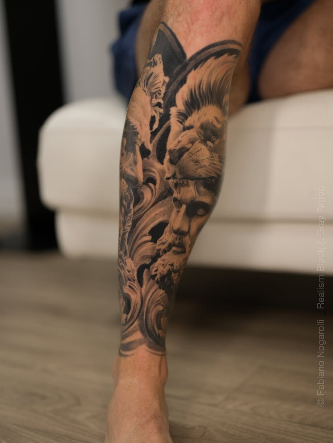 Tattoo by @nogarolli_tattoo — realism, black_and_grey