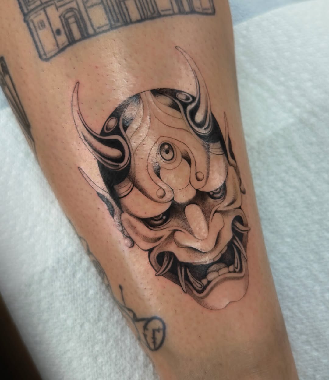 Oni mask Japanese tattoo on the forearm by Hery Anwar