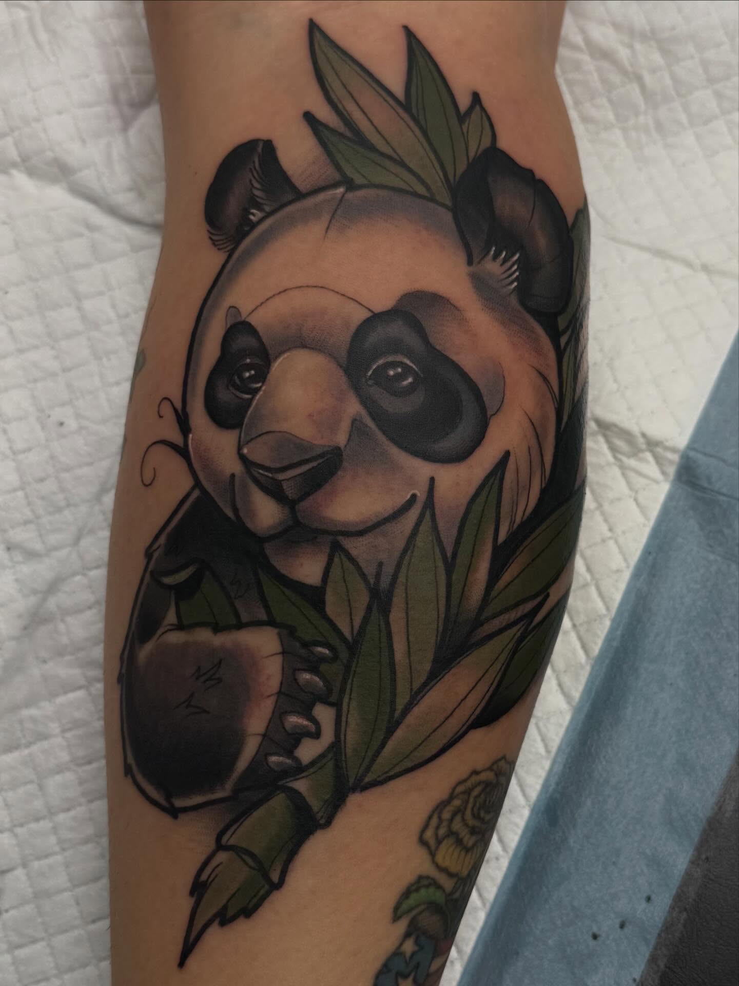Panda realism tattoo on the forearm by Chris Smiseck