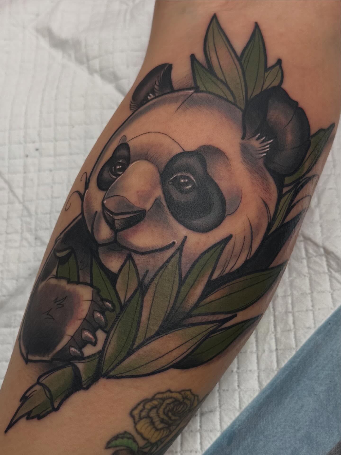Panda American traditional tattoo on the forearm by Chris Smiseck