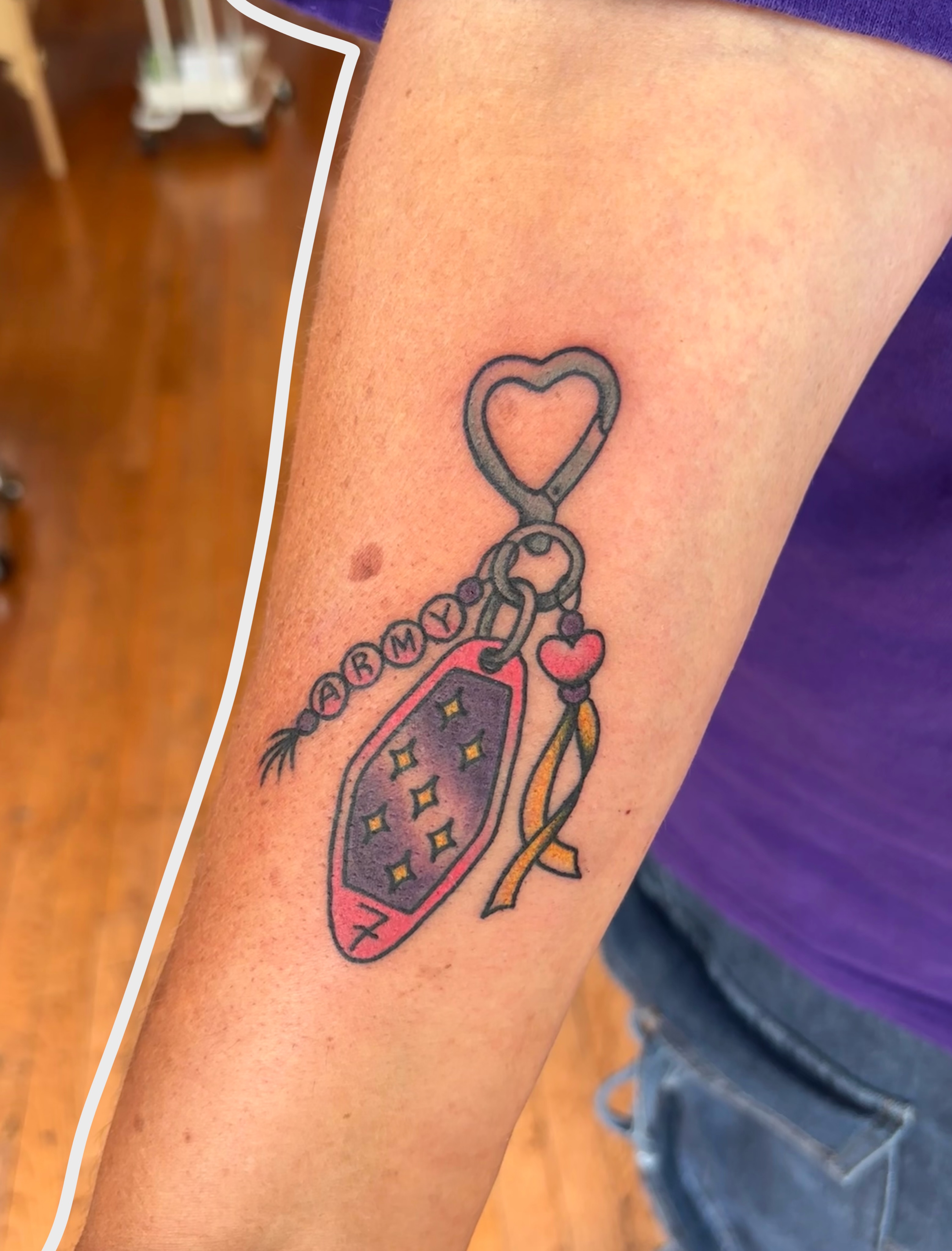 Keychain dotwork tattoo on the forearm by Emmy Stepien