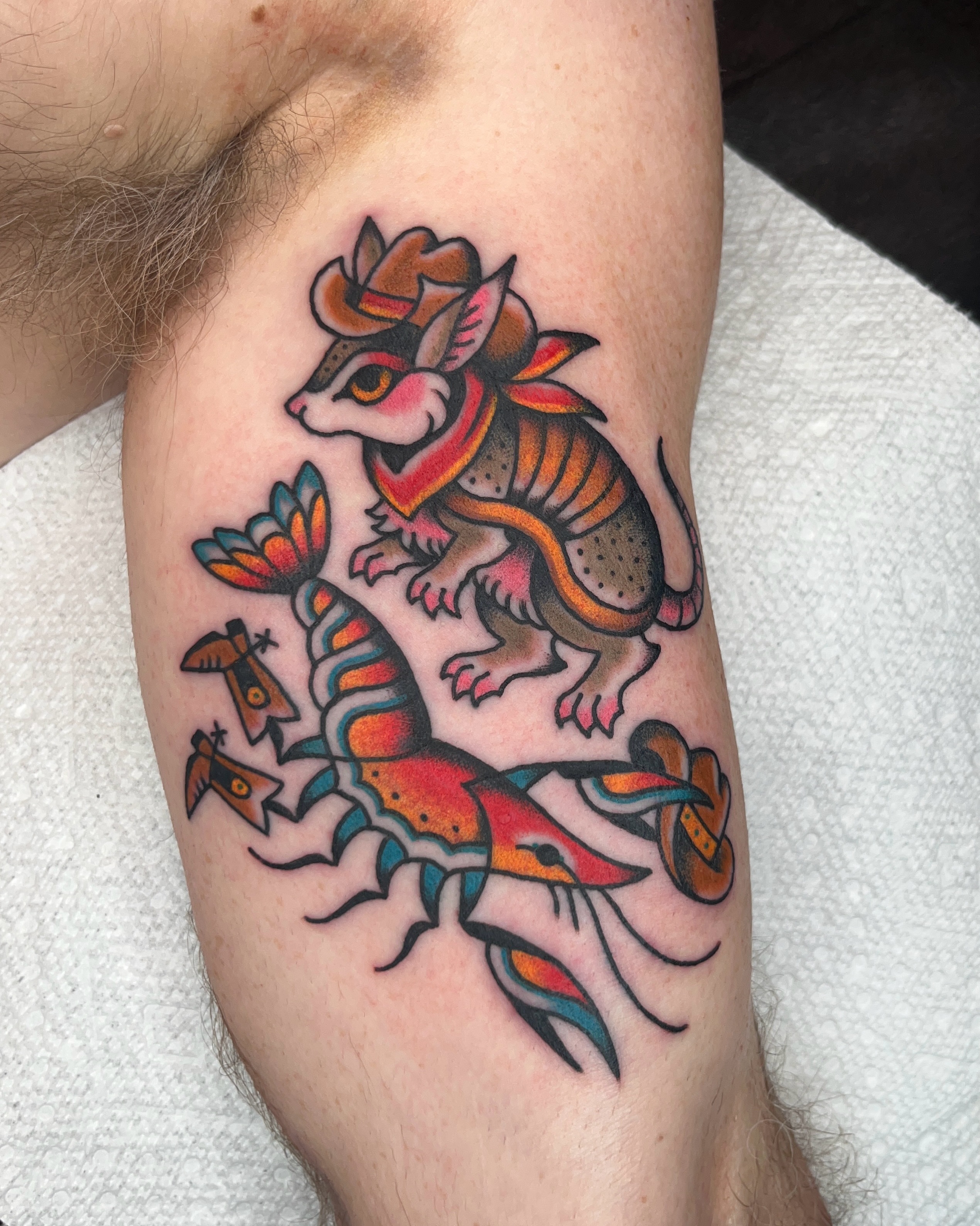 Possum and snake American traditional tattoo on the forearm by Nat Power