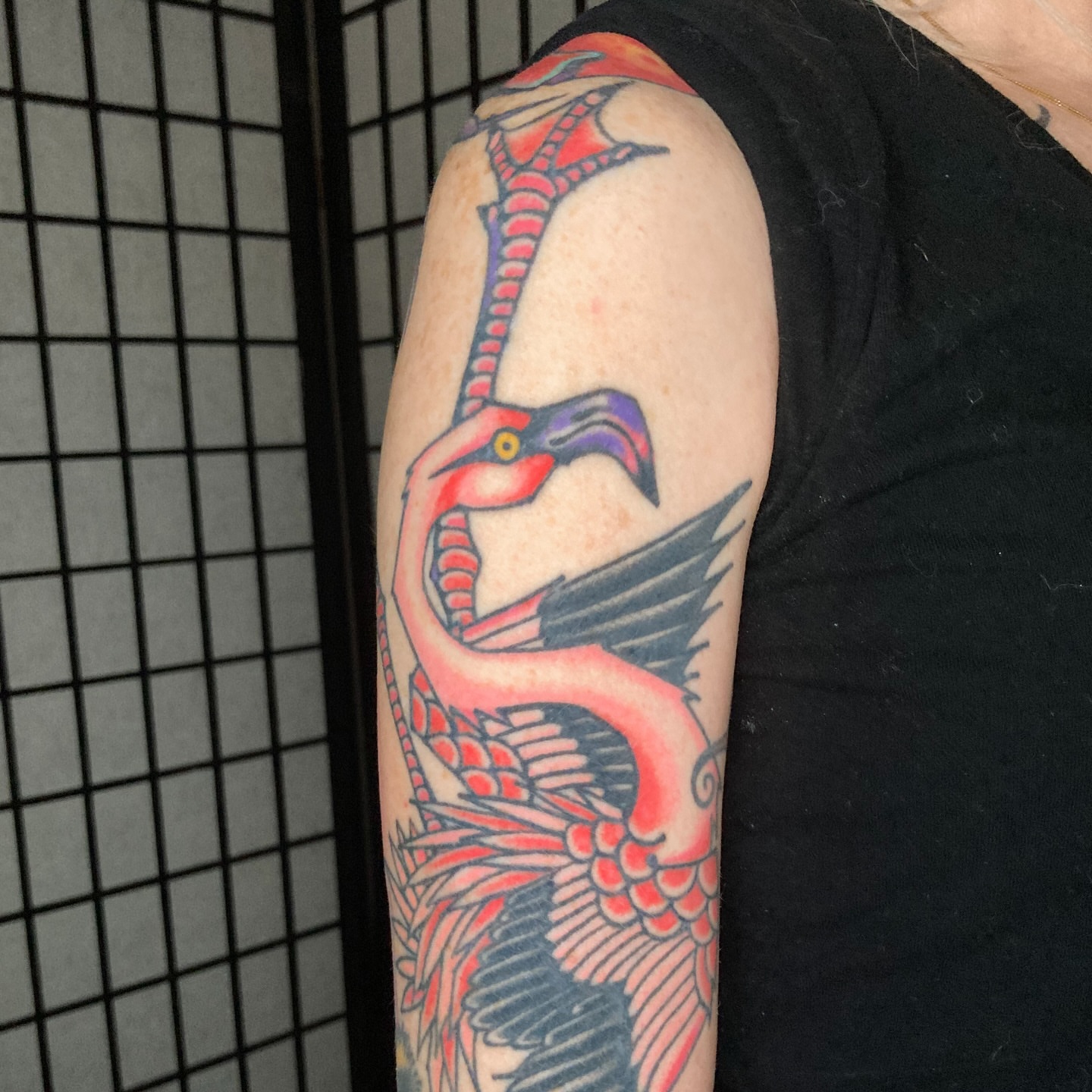 Flamingo American traditional tattoo on the upper arm by 🌴Nick Hetzel🌴, Saint Petersburg, Florida