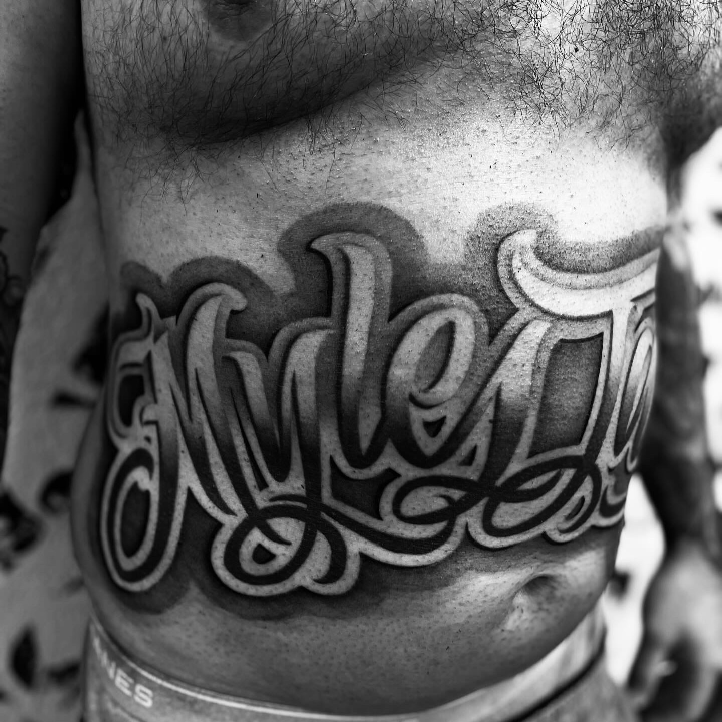 Tattoo by @paul_racks — lettering_script