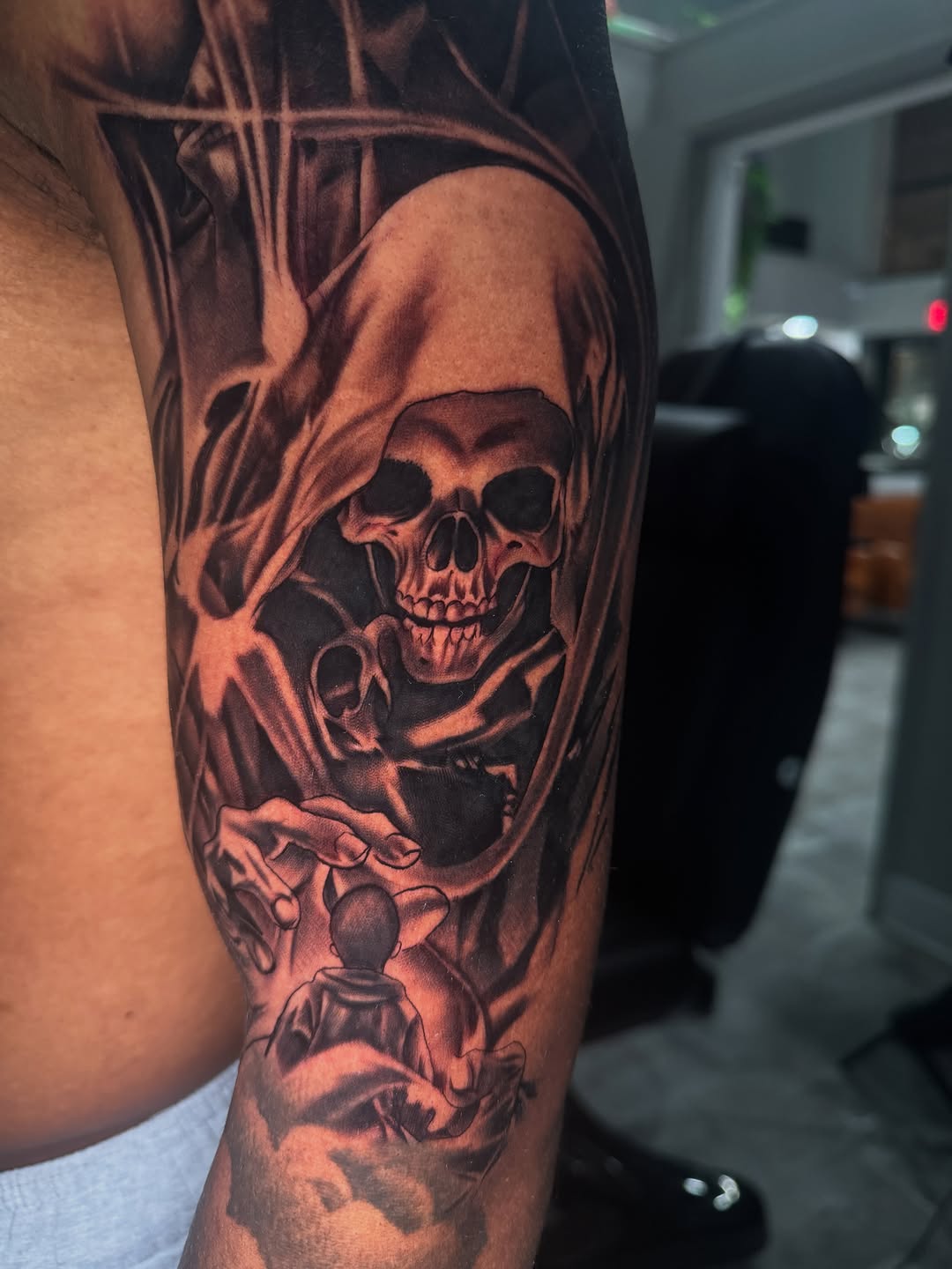 Tattoo by @cofaxtattoos — realism, black_and_grey
