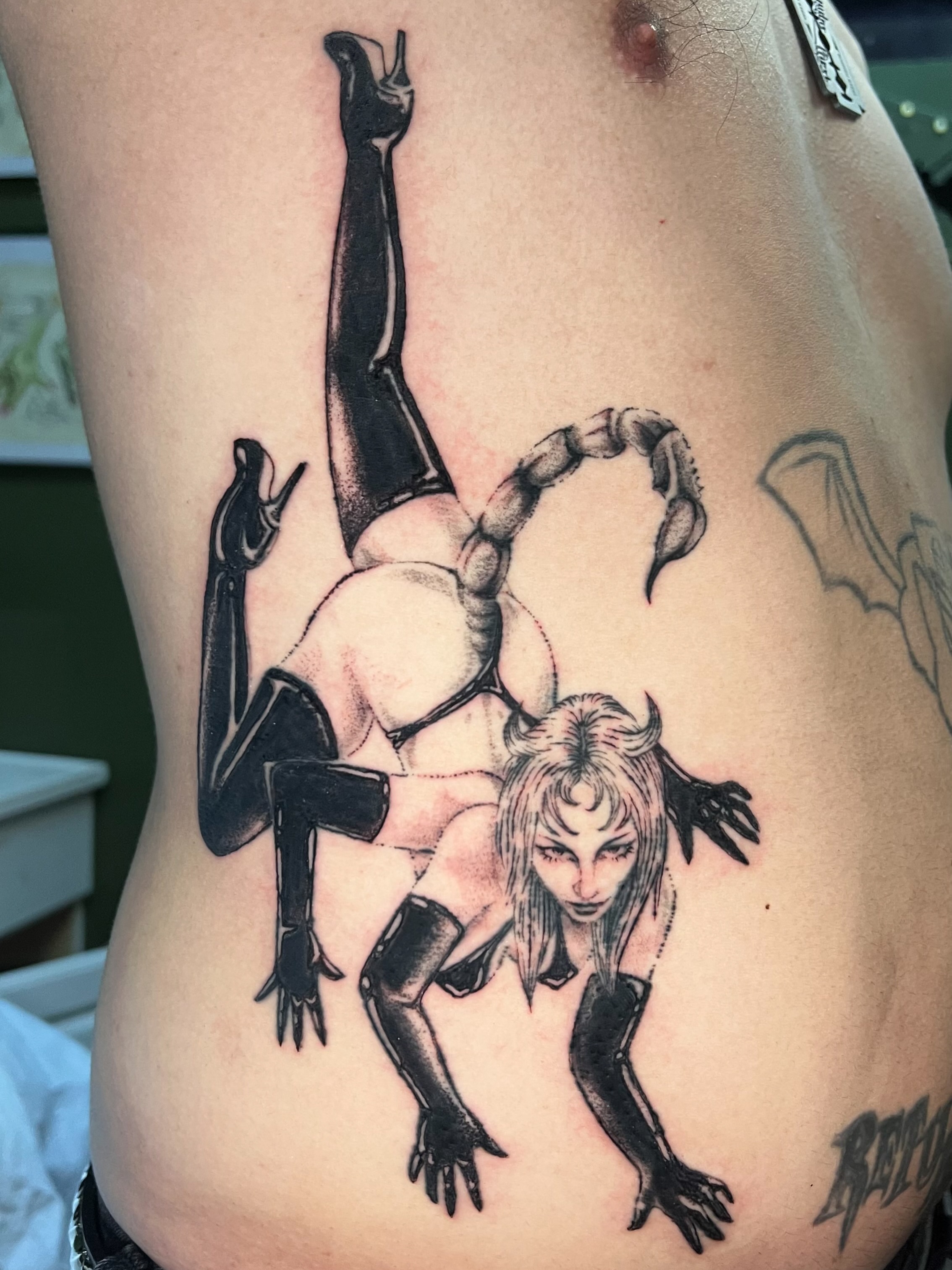 Demon woman realism tattoo on the ribs by ꧁ 𝓛𝖎𝖛 ꧂, Cambridge, Massachusetts
