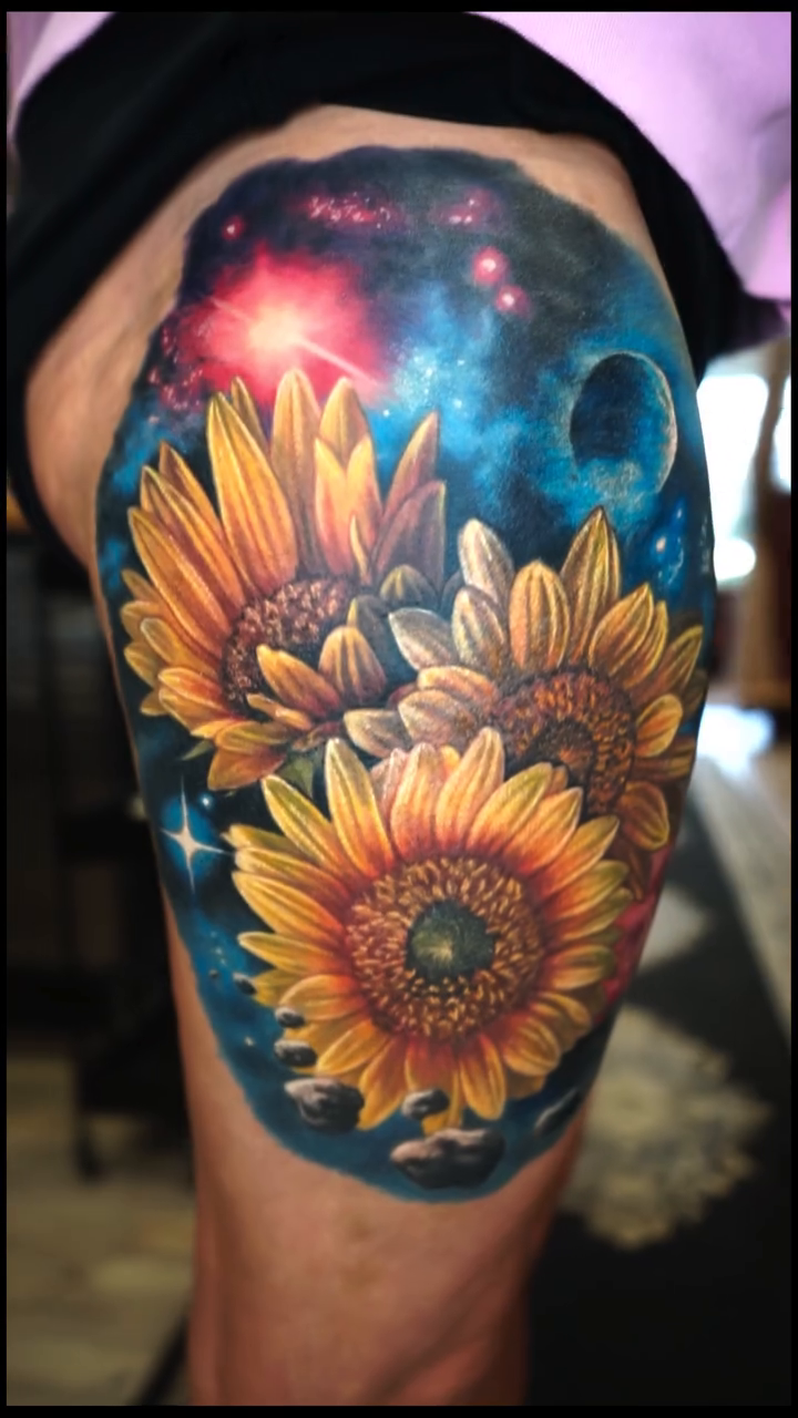 Sunflowers in space realism tattoo by Tony Johnson - Tattoo Artist, Huntsville, Alabama