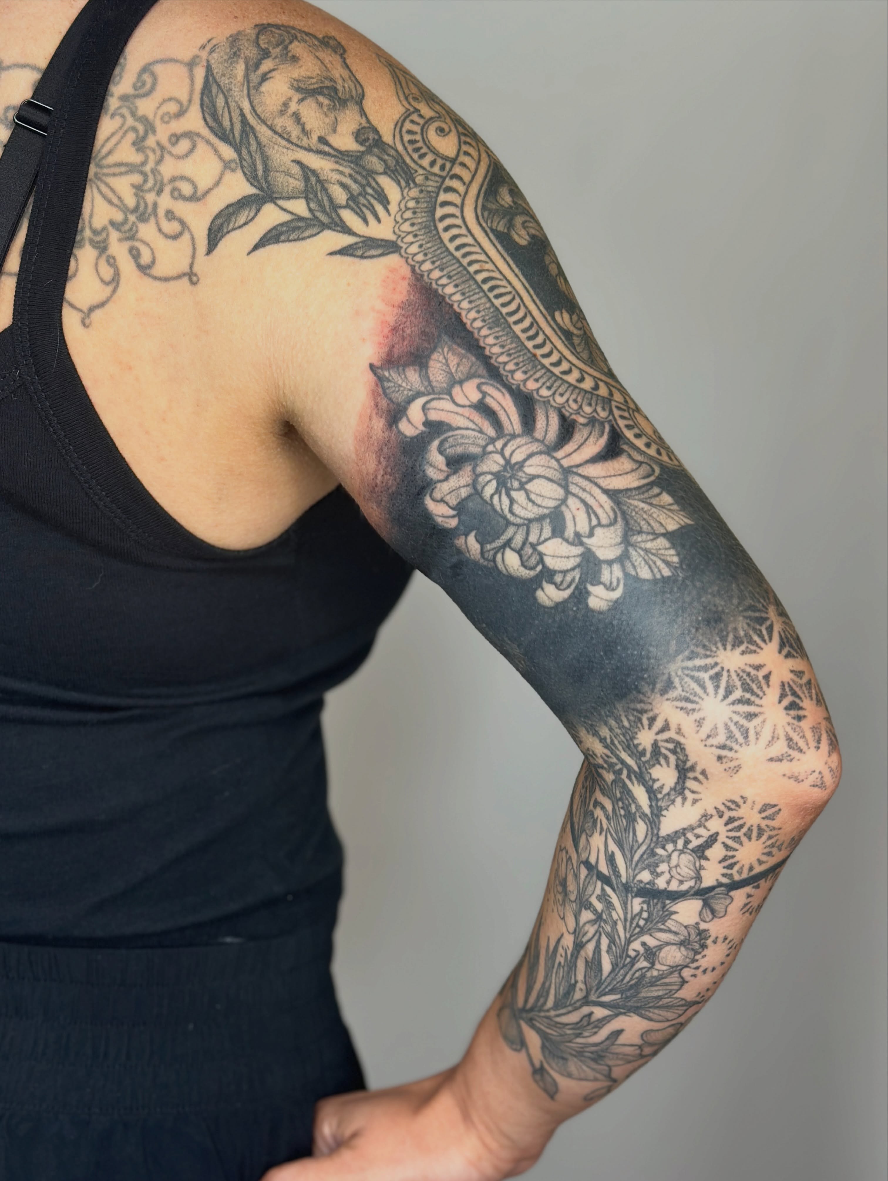 Floral and ornamental ornamental tattoo on the upper arm by Gabrielle Brodman 🎀 Raleigh-Durham Tattoo