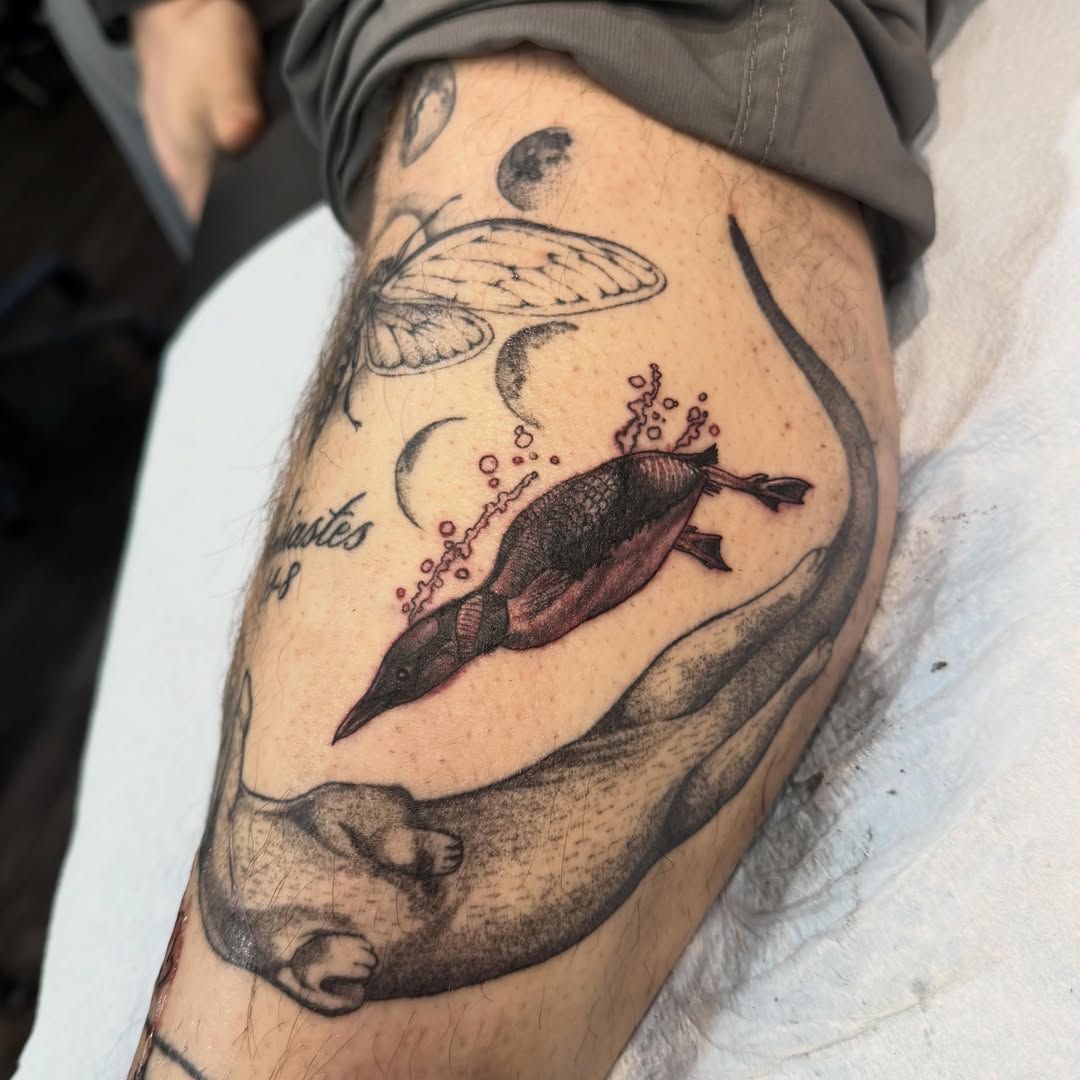 Duck and fish realism tattoo on the thigh by Cory Haberman