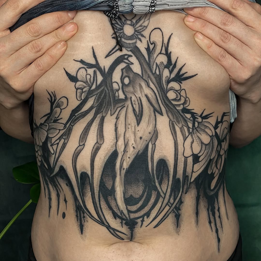 Tattoo by @gitta_mikk_tattoo — black_and_grey, dark_realism