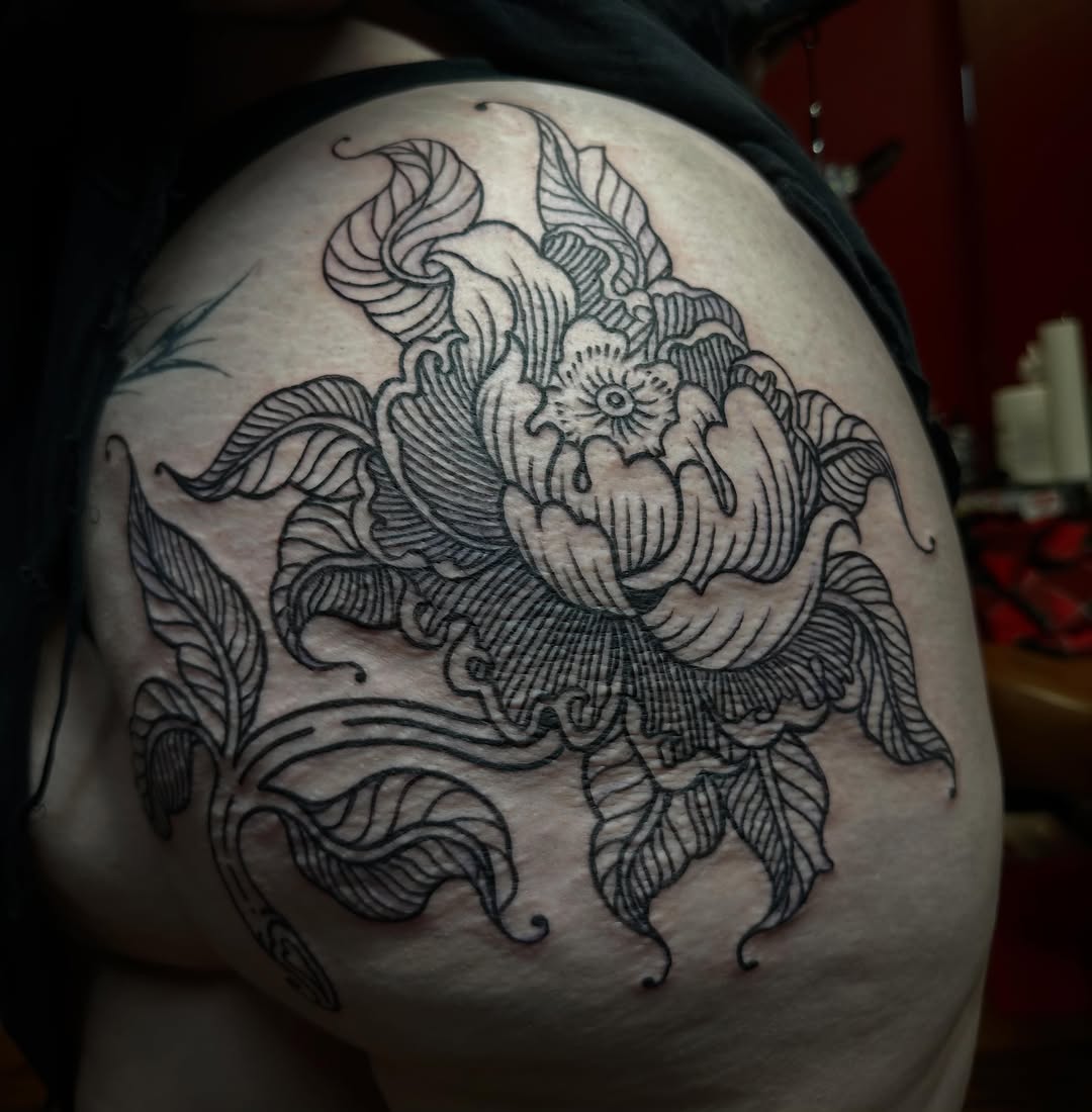 Peony flower dotwork tattoo on the thigh by emma christine