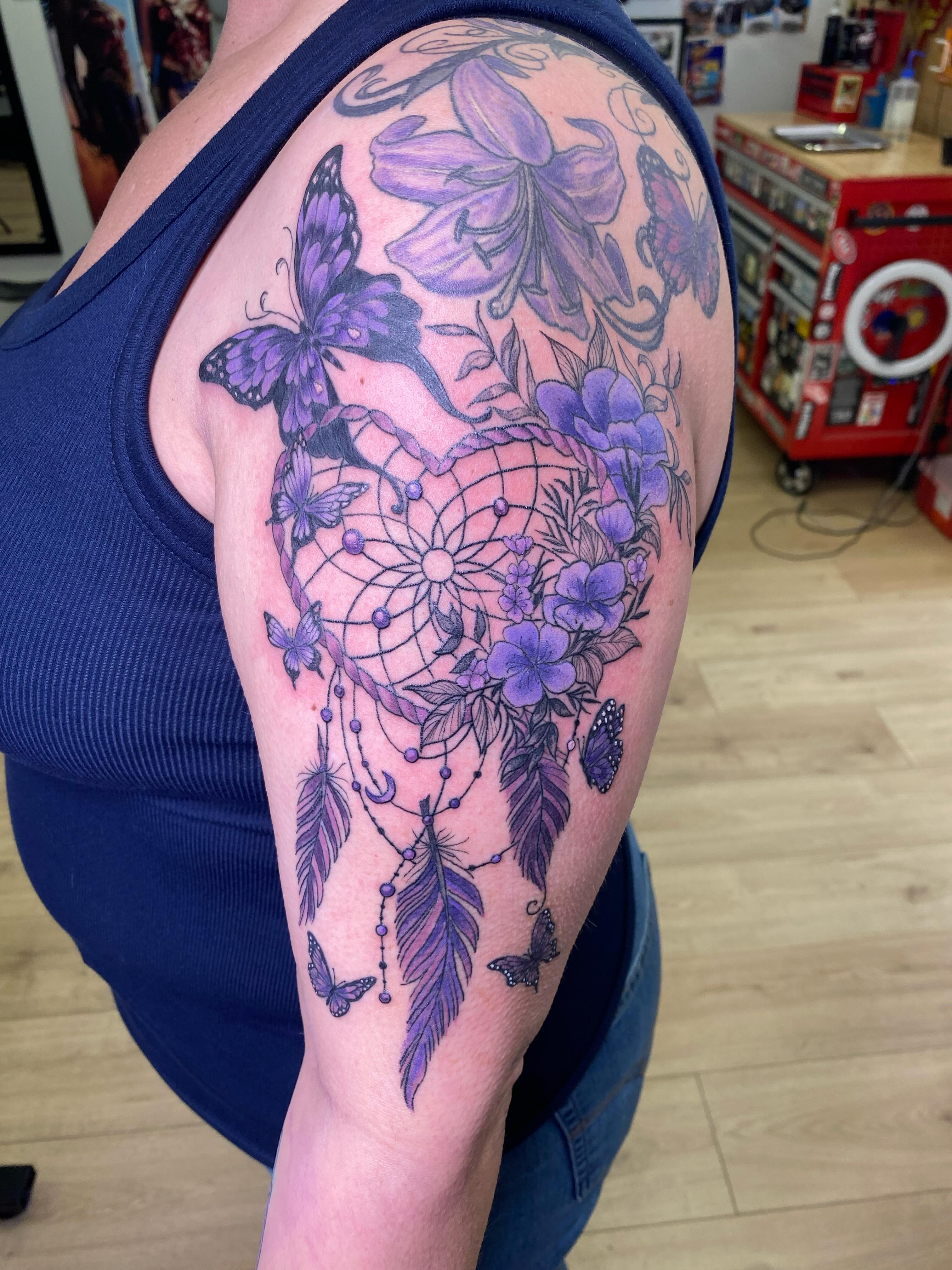 Dreamcatcher dotwork tattoo on the shoulder by Katie Leeper