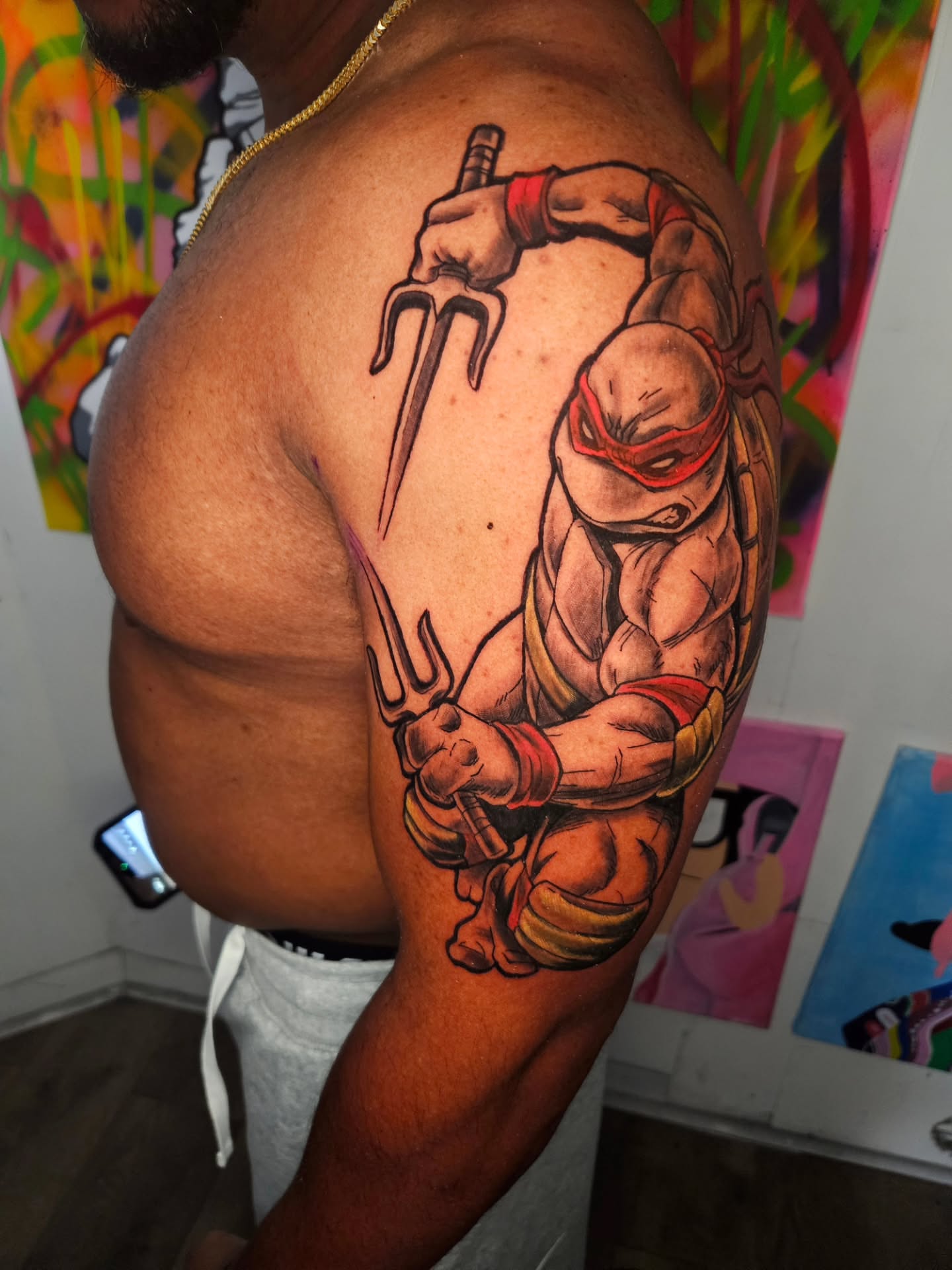Teenage mutant ninja turtle realism tattoo on the shoulder by Justx4rt