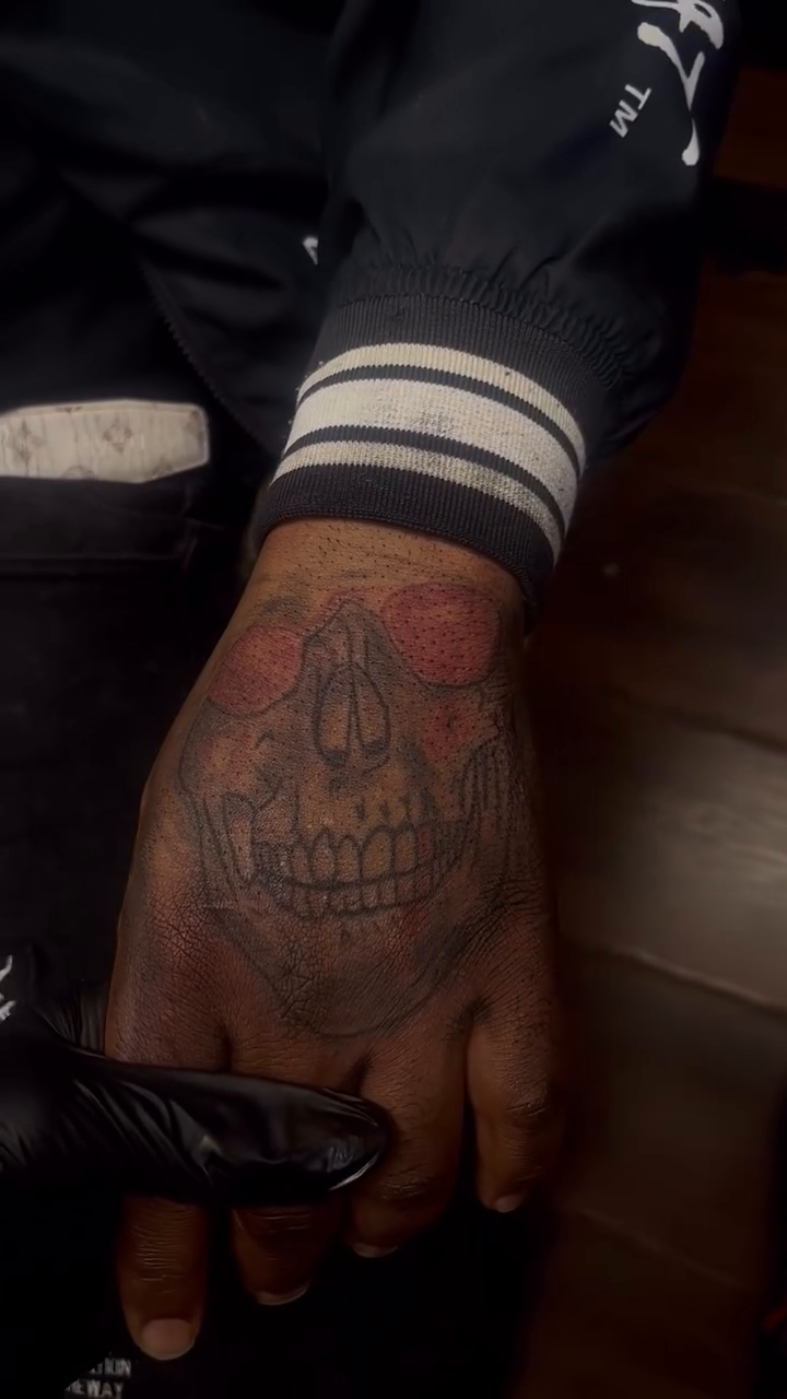 Skull tattoo on hand realism tattoo on the hand by Tatts by Quan