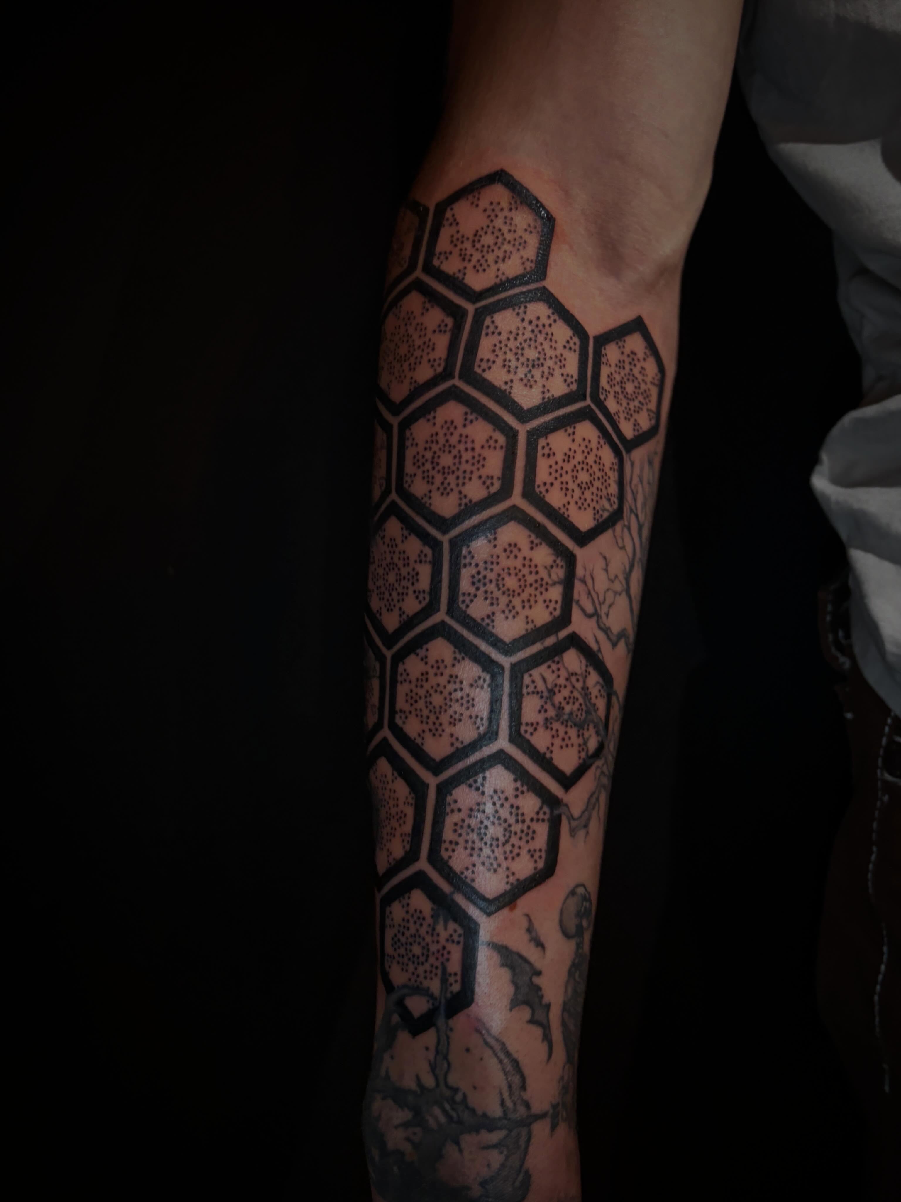 Hexagonal pattern dotwork tattoo on the forearm by Tattoo Artist Lilliann:)