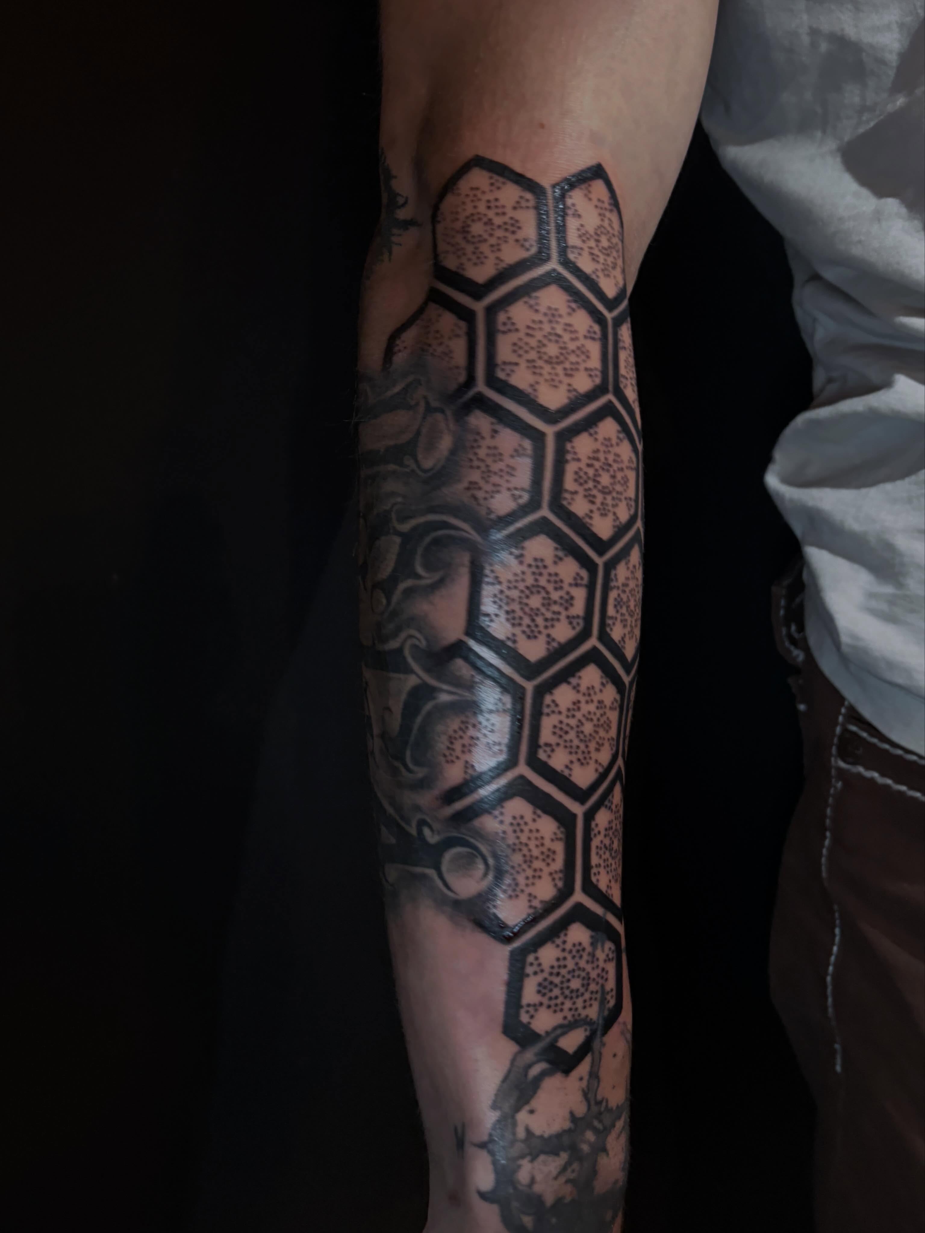 Hexagonal pattern dotwork tattoo on the forearm by Tattoo Artist Lilliann:)