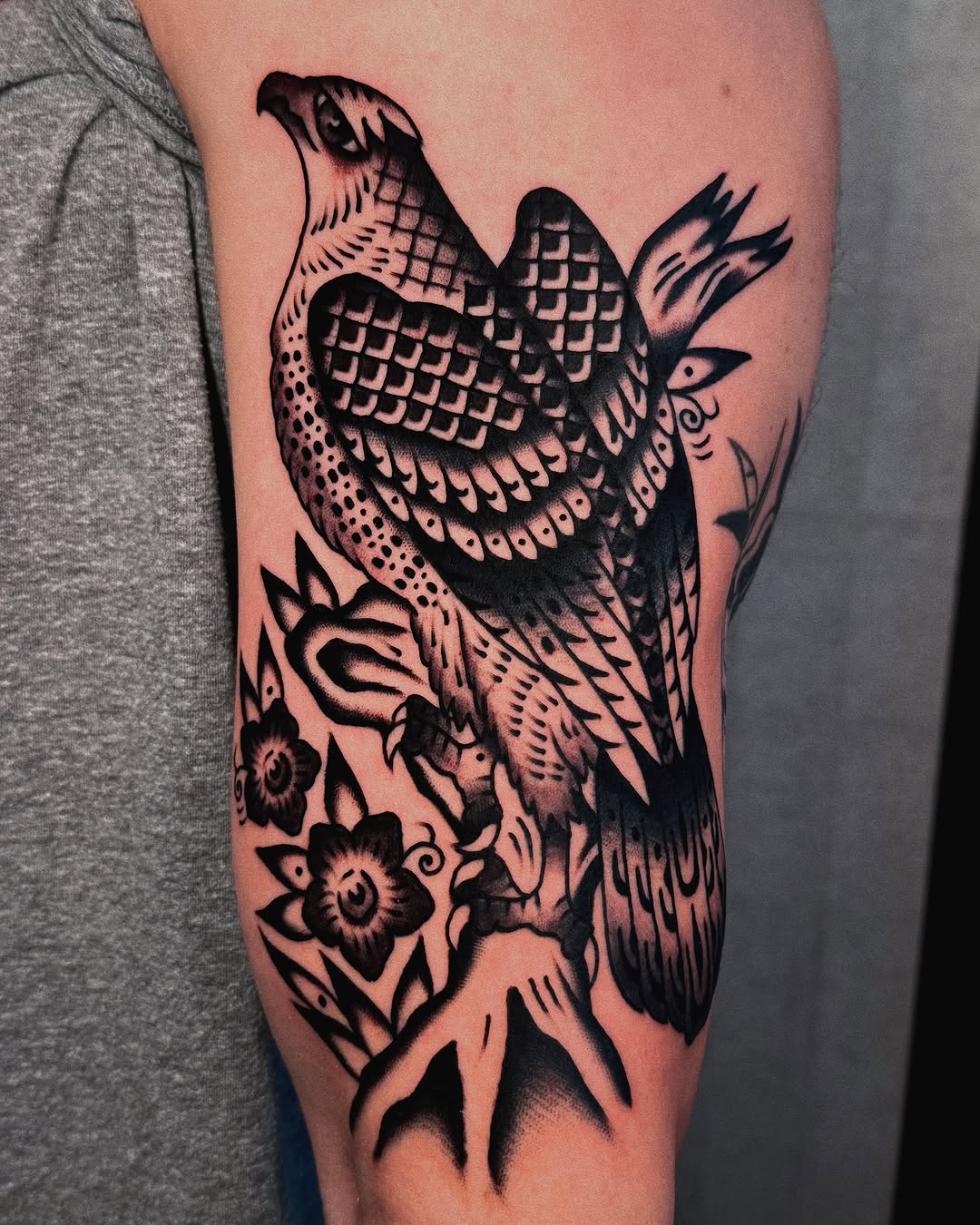 Hawk and flowers American traditional tattoo on the forearm by Sean Michel, Nashua, New Hampshire