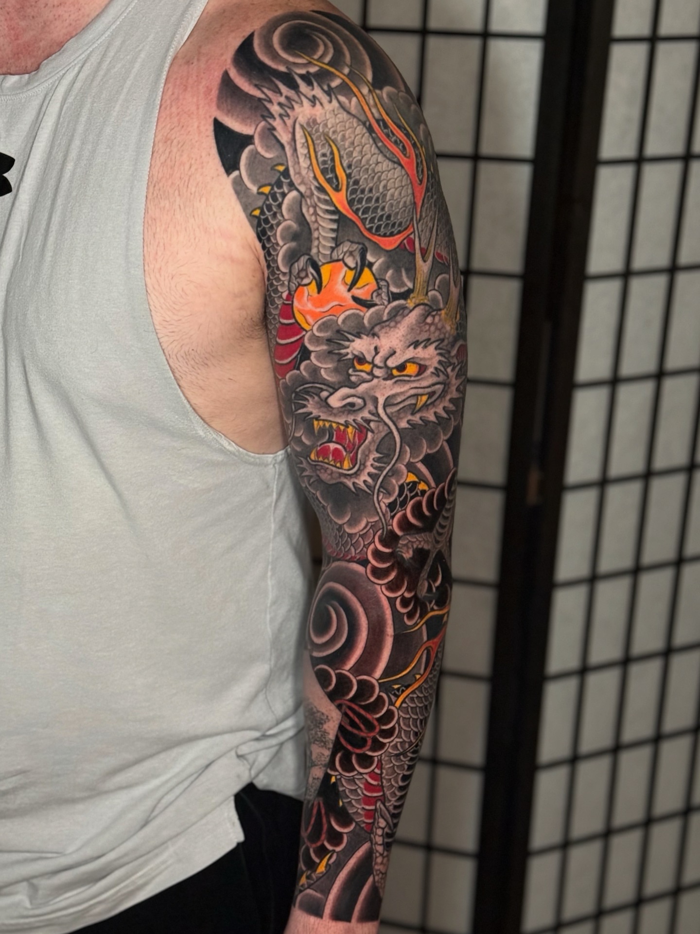 Dragon japanese irezumi tattoo on the upper arm by Mario Arcila