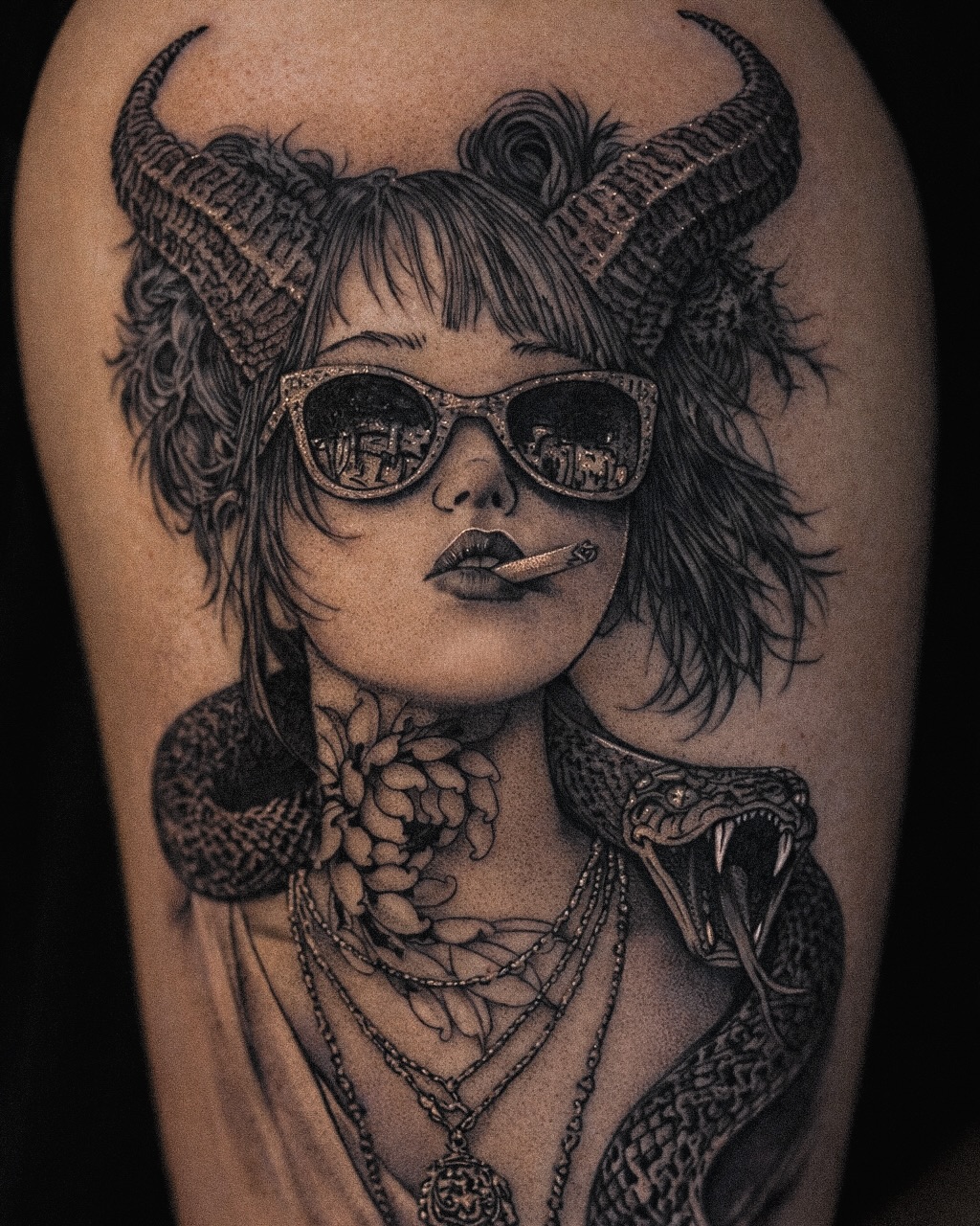 Woman with horns and snake realism tattoo on the forearm by Mak$ Brand