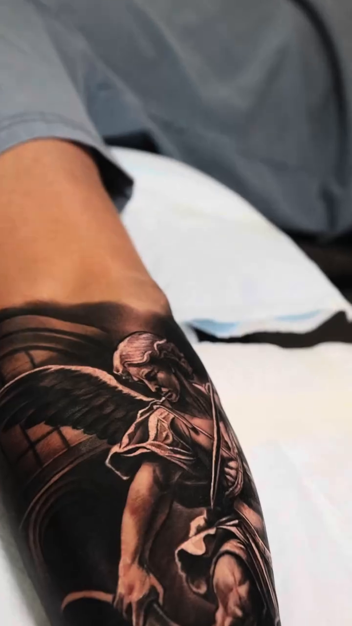 Angel and demon realism tattoo by Ali Saleh 🇱🇧 Detroit Tattoo Artist, Dearborn, Michigan