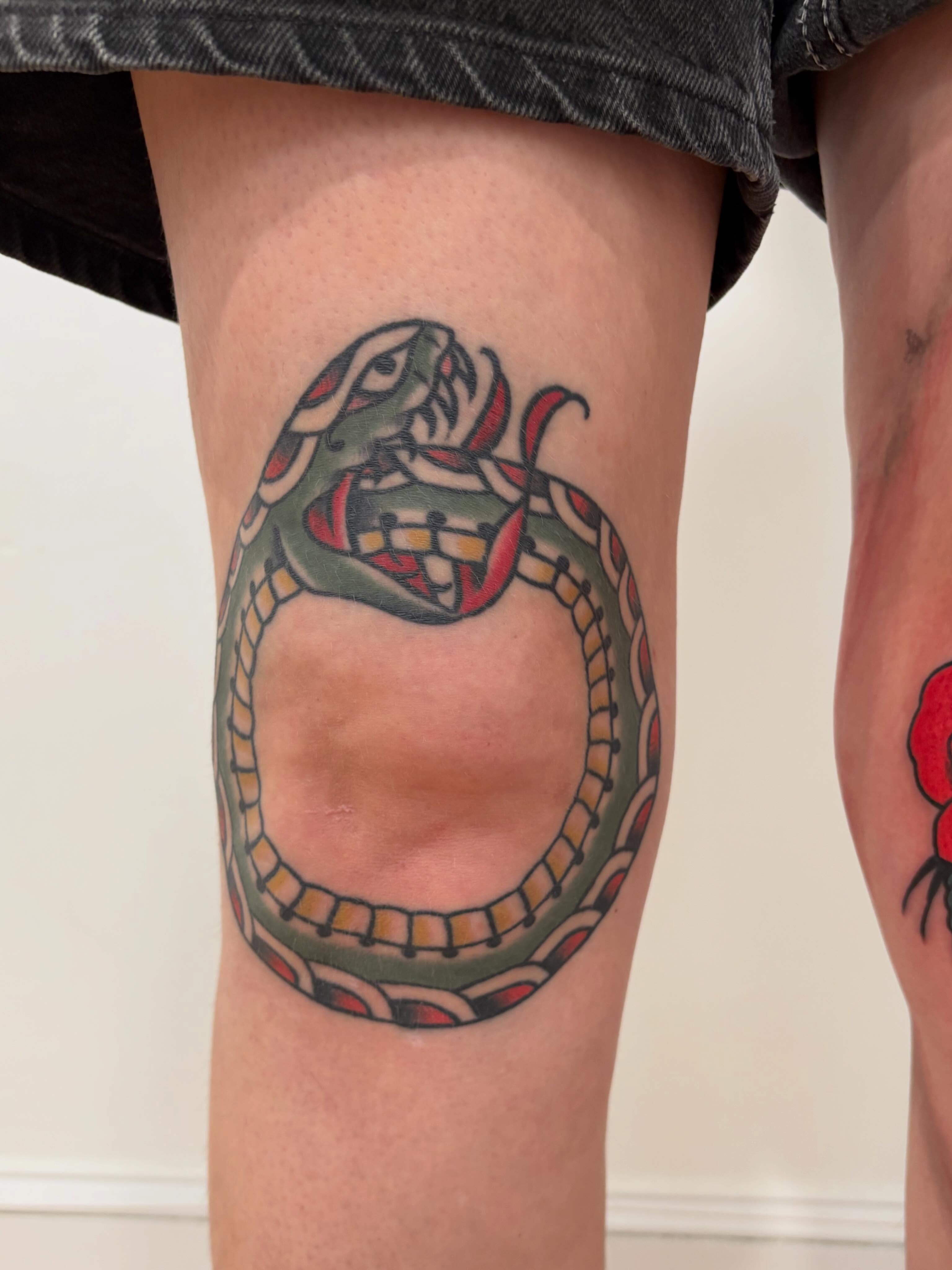 Snake American traditional tattoo on the thigh by Evan Bisso, Philadelphia, Pennsylvania