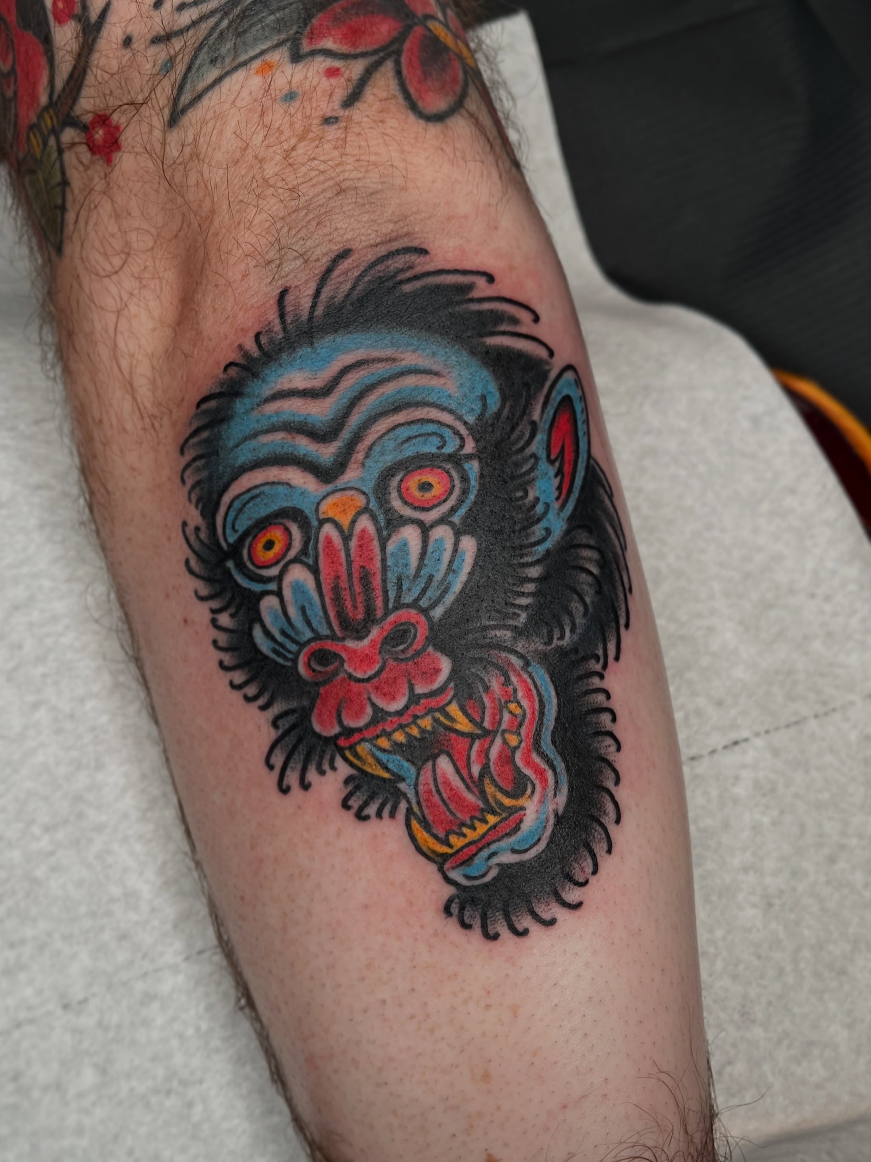 Monkey head American traditional tattoo on the forearm by Allyson Blessing Tattoos