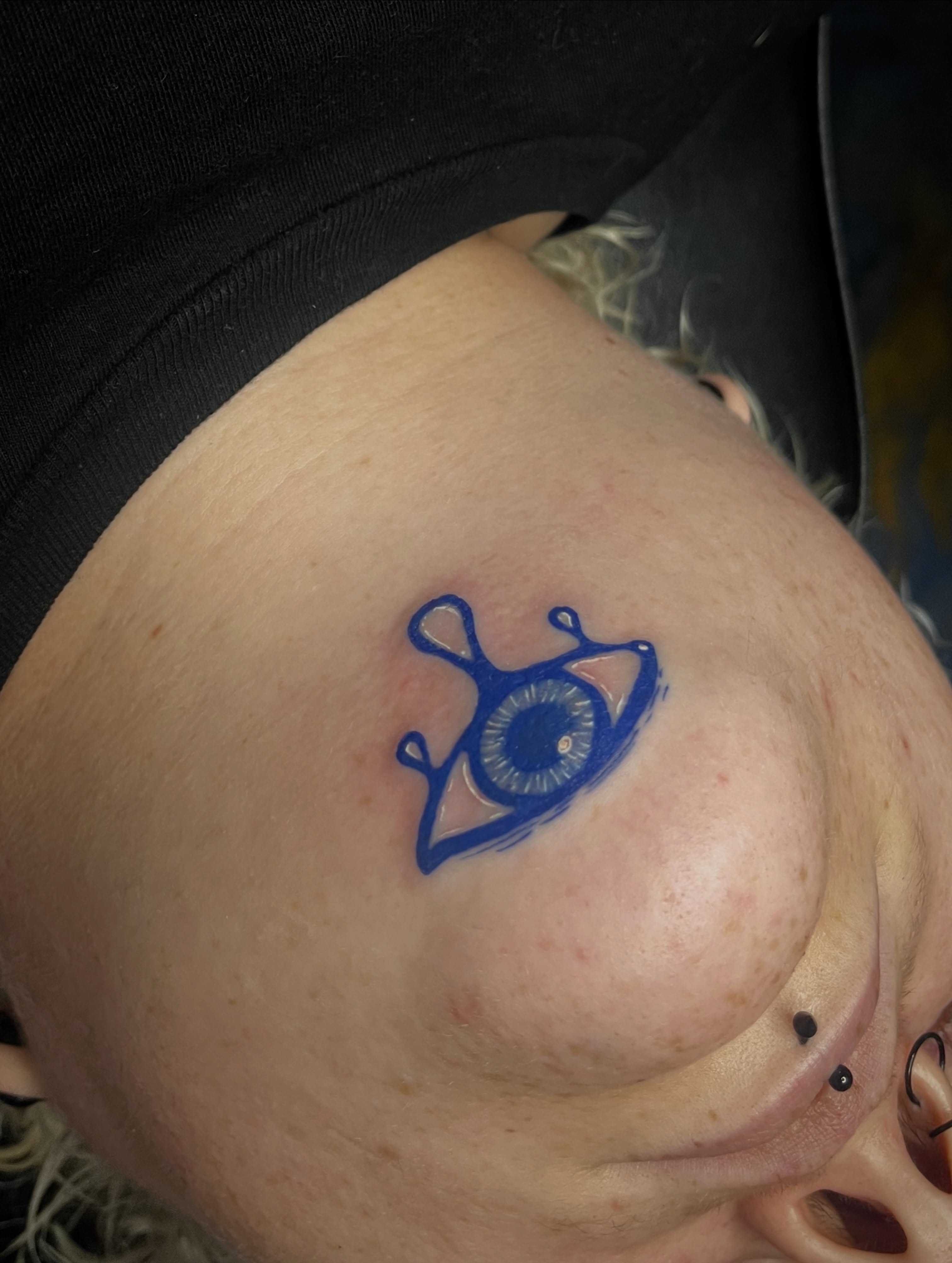 Eye geometric tattoo on the shoulder by Sid