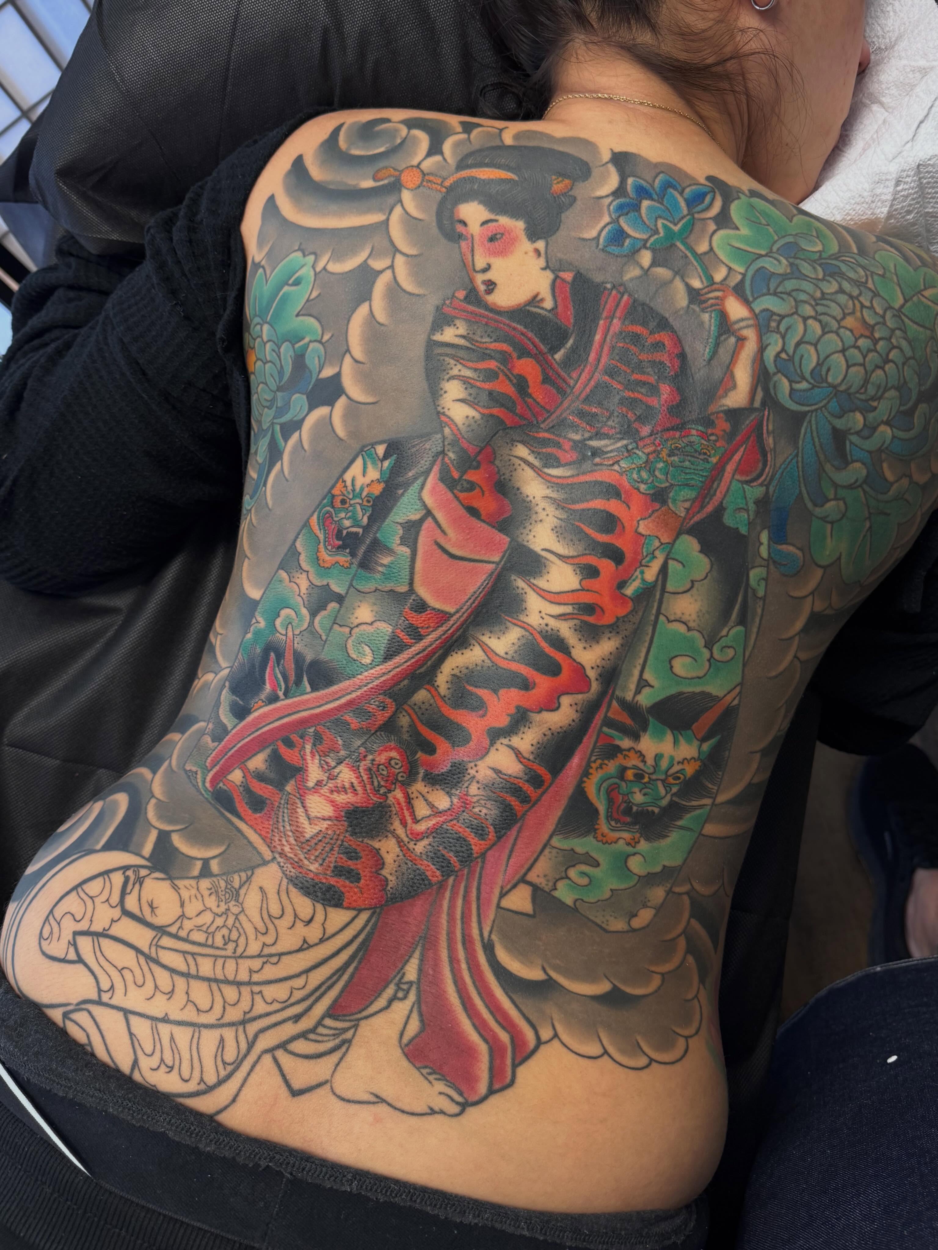 Geisha and dragon japanese irezumi tattoo on the back by Landon Lewis