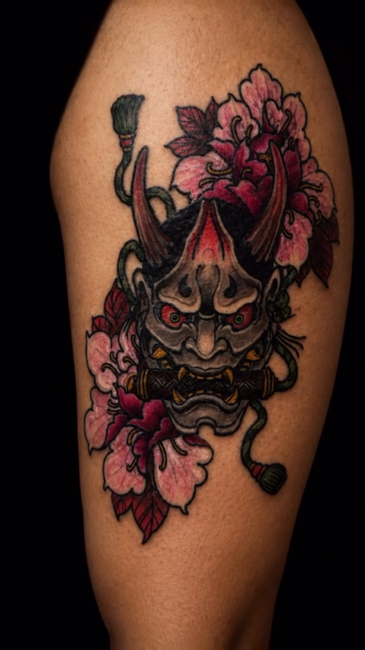 Hannya mask with peonies Japanese tattoo on the forearm by Christhian King