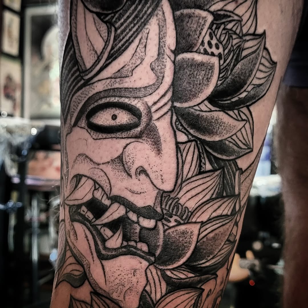 Mask with lotus dotwork tattoo on the forearm by brockton a f 💀