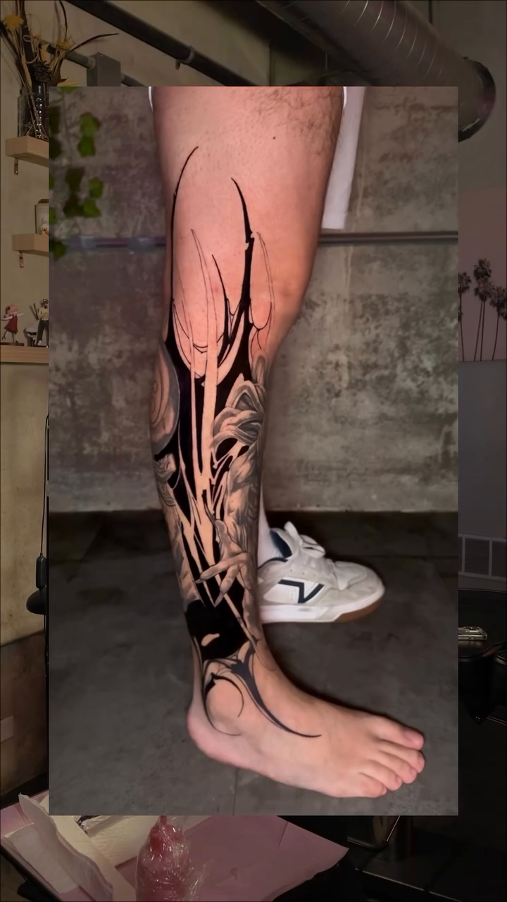 Abstract leg tattoo blackwork tattoo on the leg by Tattoo Artist Vanessa