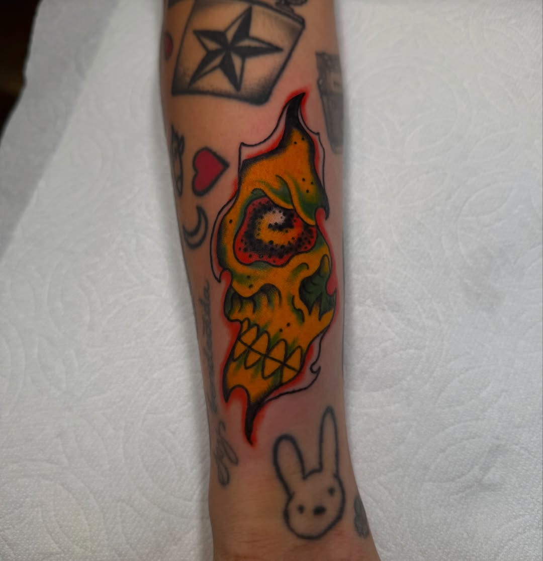 Skull new school tattoo on the forearm by Tyler Brown, San Diego, California
