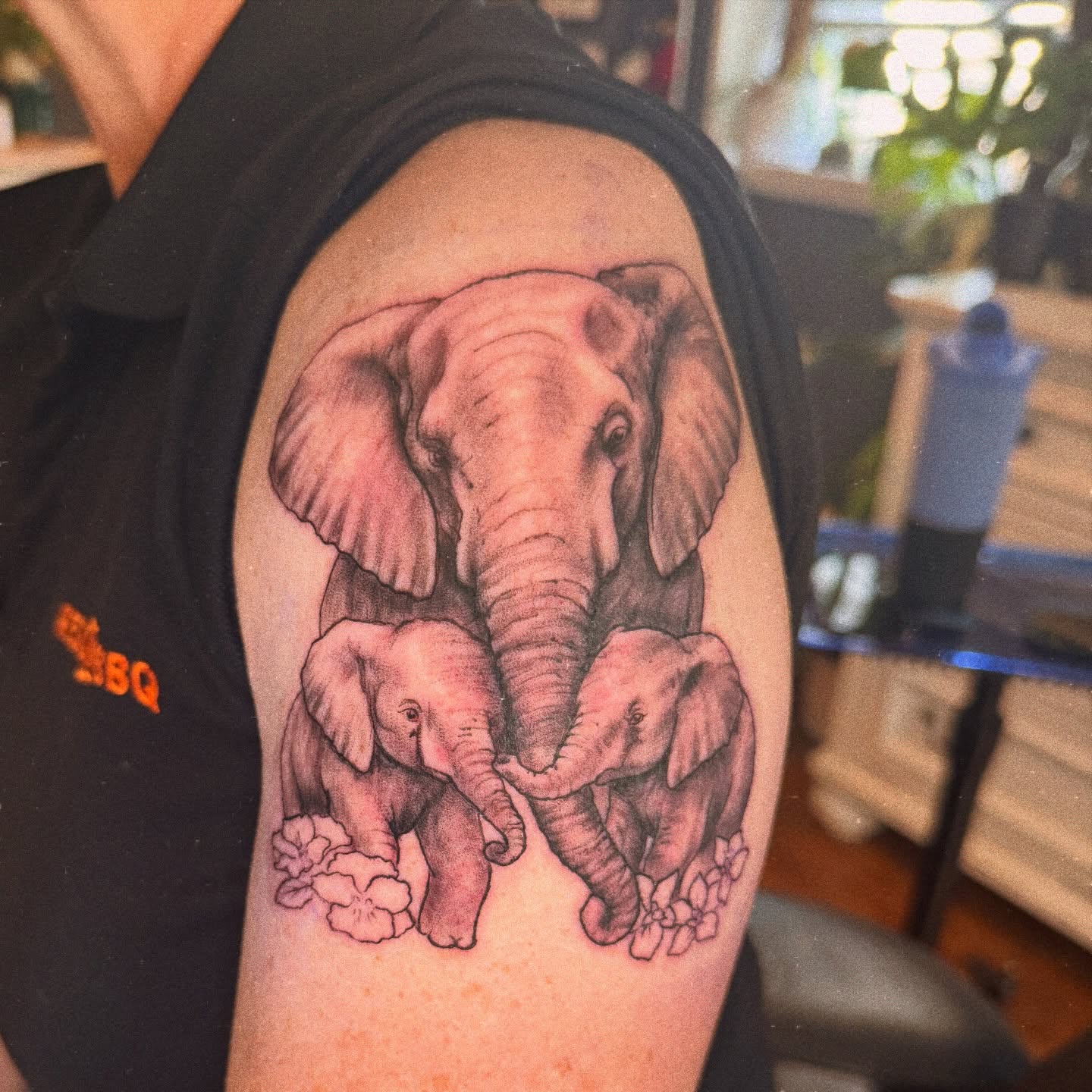 Elephants realism tattoo on the forearm by Eric Burns - NoVA Tattoo Artist