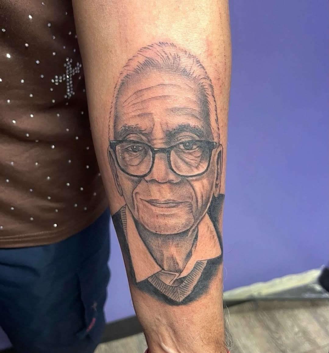 Realism tattoo on the forearm by Mark Calloway
