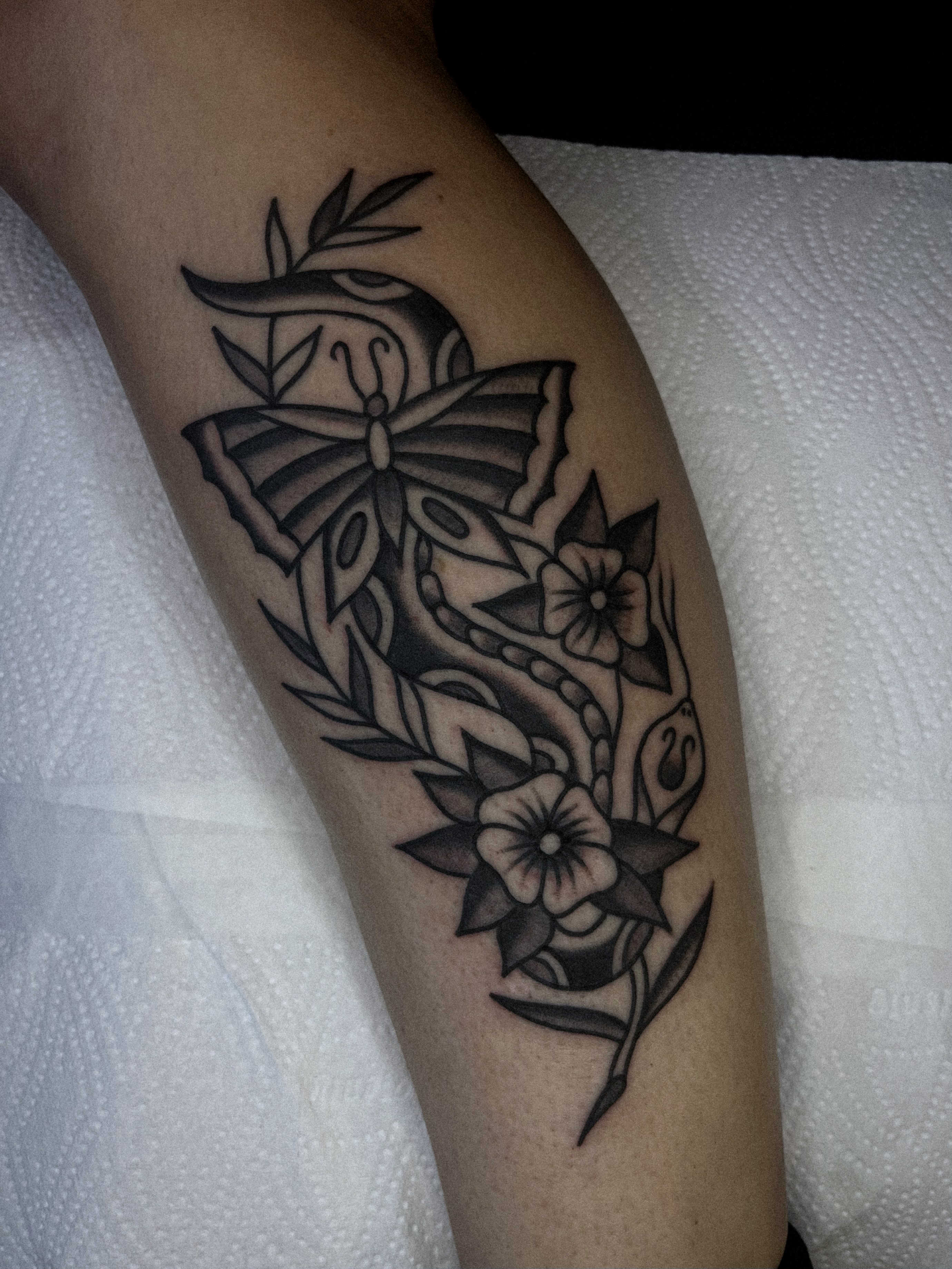 Tattoo by Ezzy Bones, Brighton, England