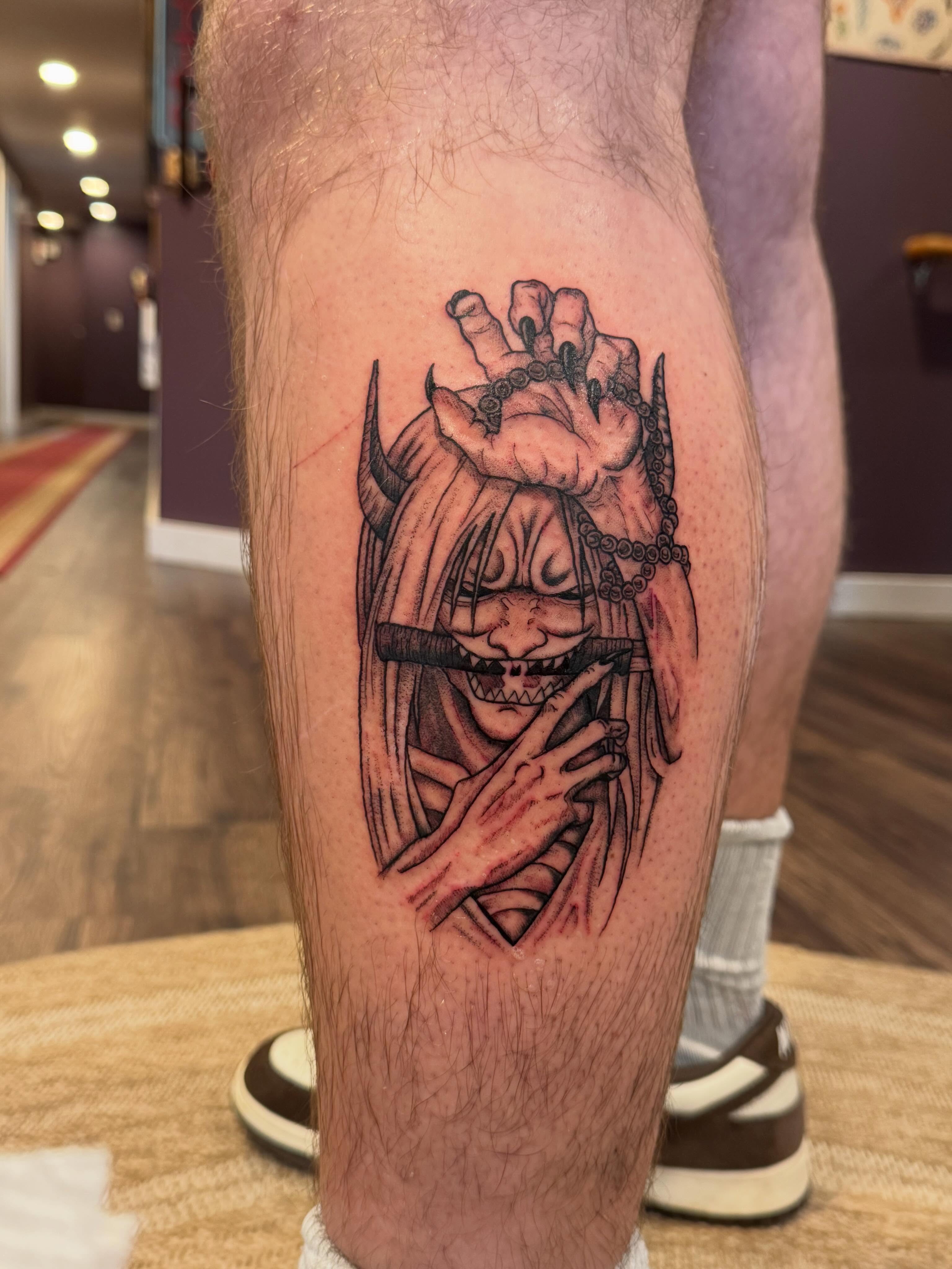 Demon dark realism tattoo on the leg by Aly Rucker, Murfreesboro, Tennessee
