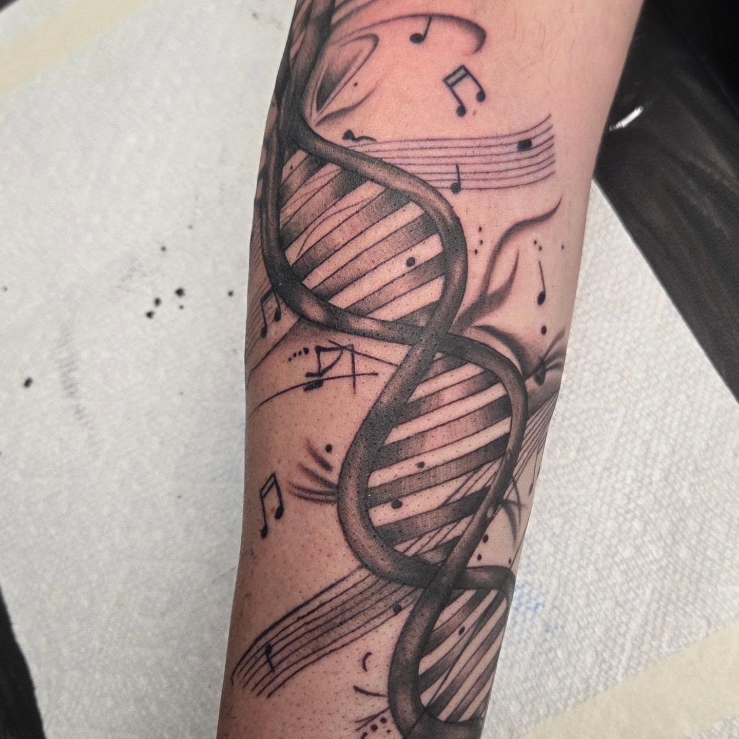 Tattoo by @crucible.ink — black_and_grey, realism