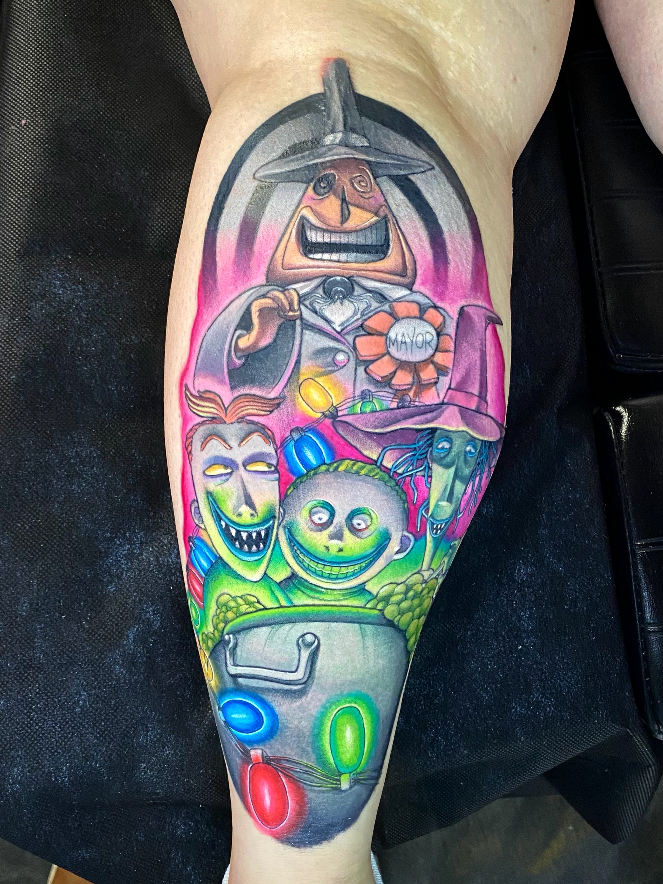 Nightmare Before Christmas characters illustrative tattoo on the forearm by Seth Mullin, Hemet, California