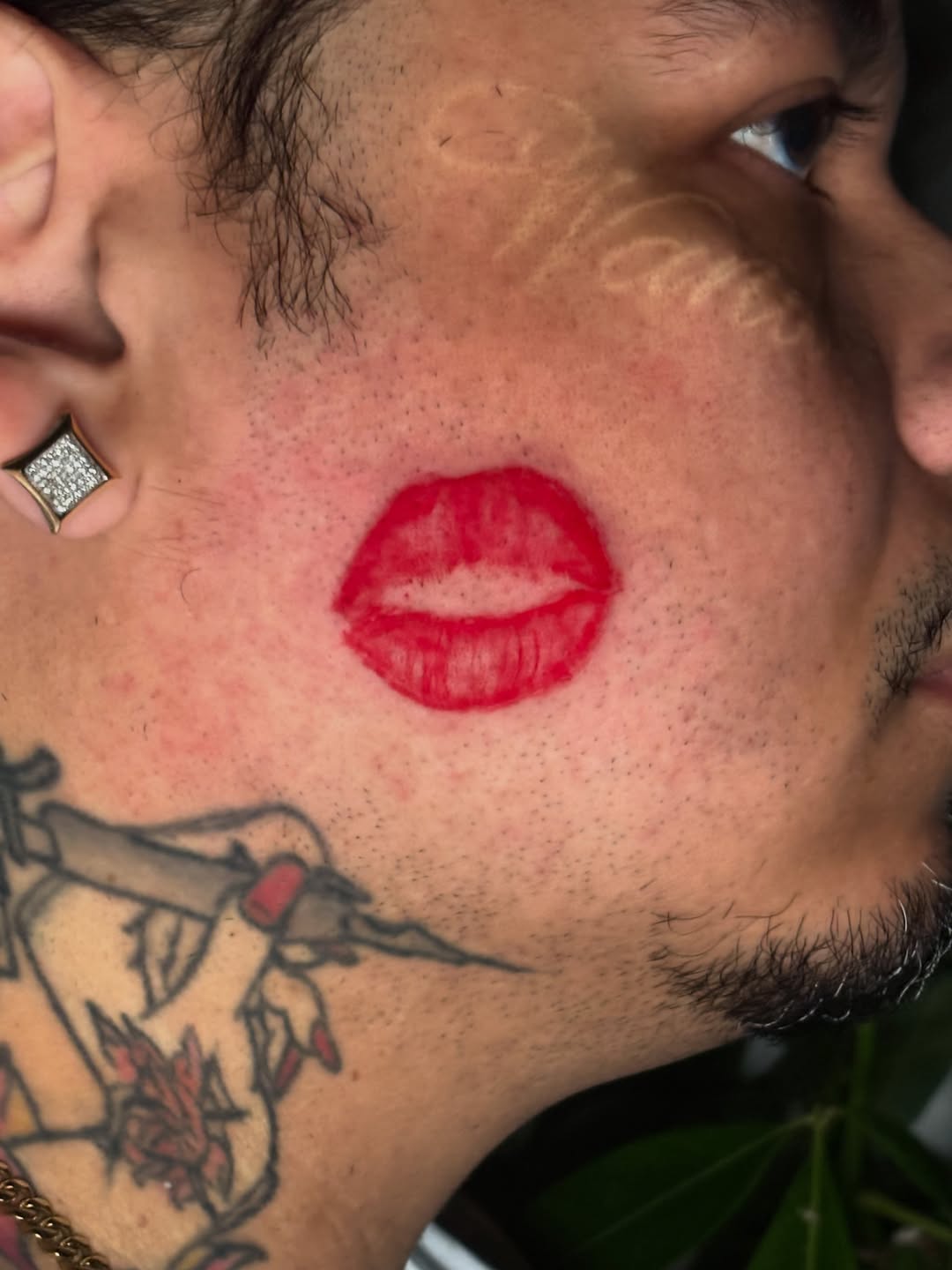Lips tattoo by Lopez Dautruche