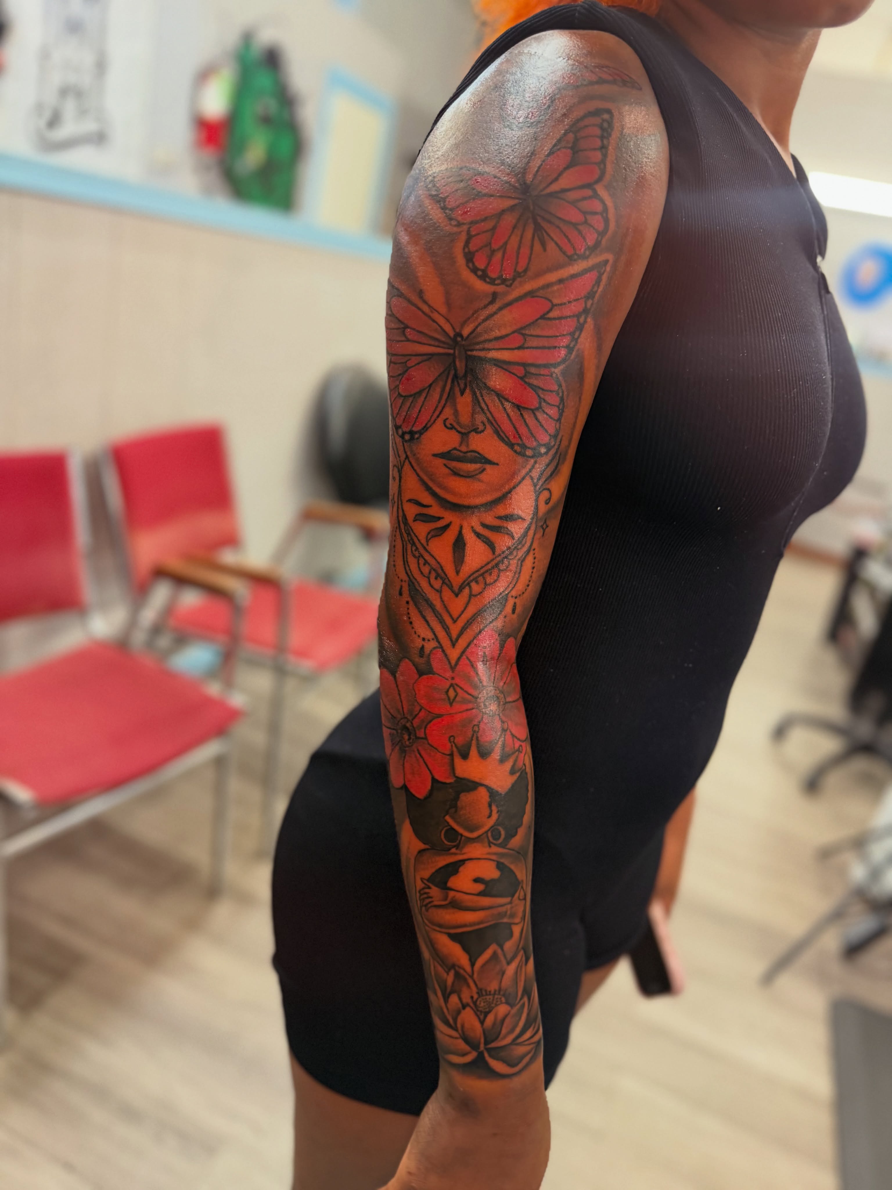 Woman's face with butterflies neo-traditional tattoo on the upper arm by JAE, Shreveport, Louisiana
