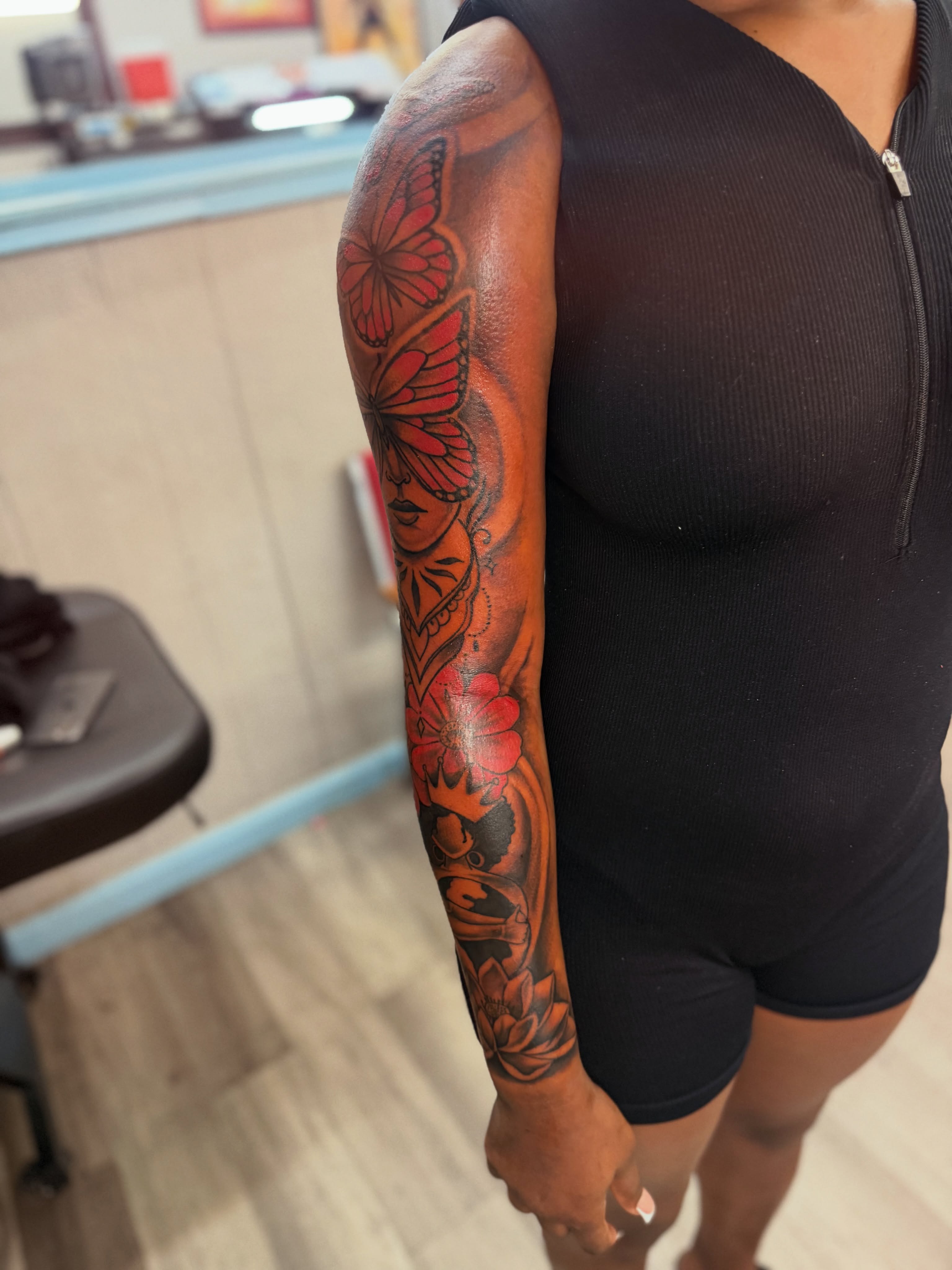 Butterfly and floral neo-traditional tattoo on the forearm by JAE, Shreveport, Louisiana