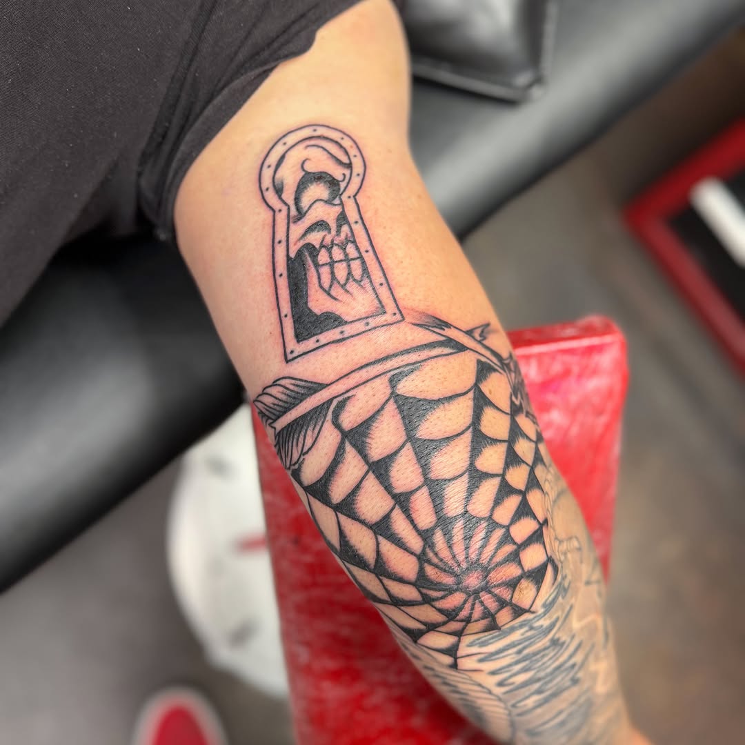 Mosaic pattern geometric tattoo on the forearm by Zac Tattooer