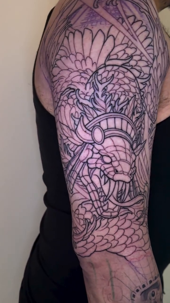 Dragon sleeve tattoo Japanese tattoo on the upper arm by Mike Nance
