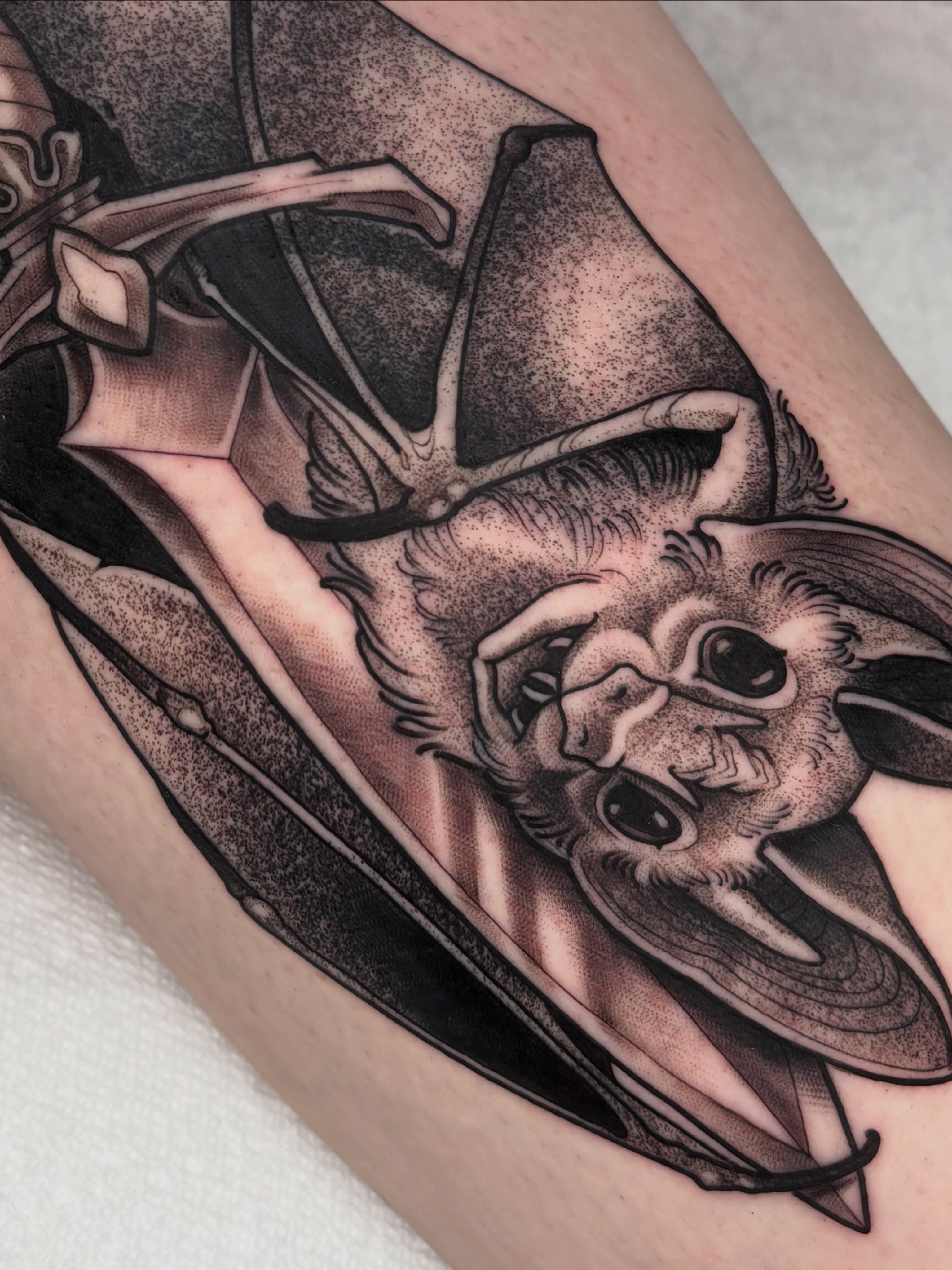 Bat dotwork tattoo on the forearm by Greg Fischer