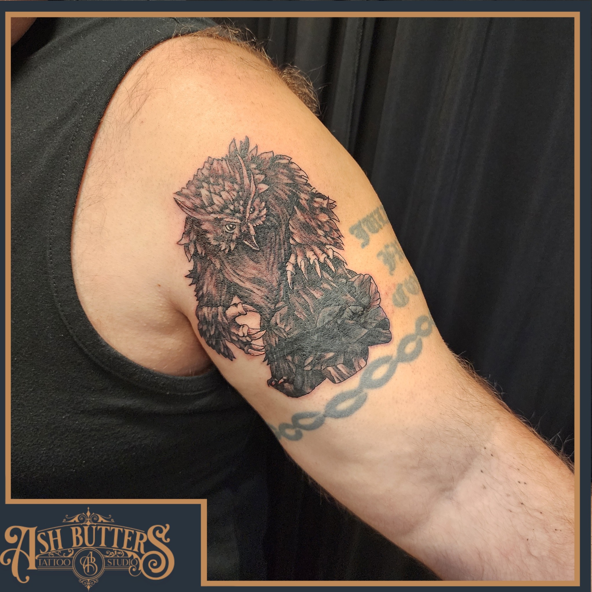 Owl black and grey tattoo on the forearm by Ash Butters