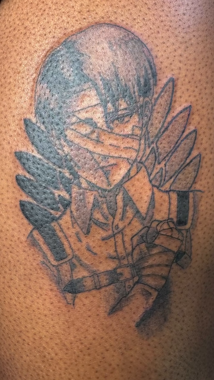 Anime character portrait tattoo on the shoulder by Charlotte Tattoo Artist💉