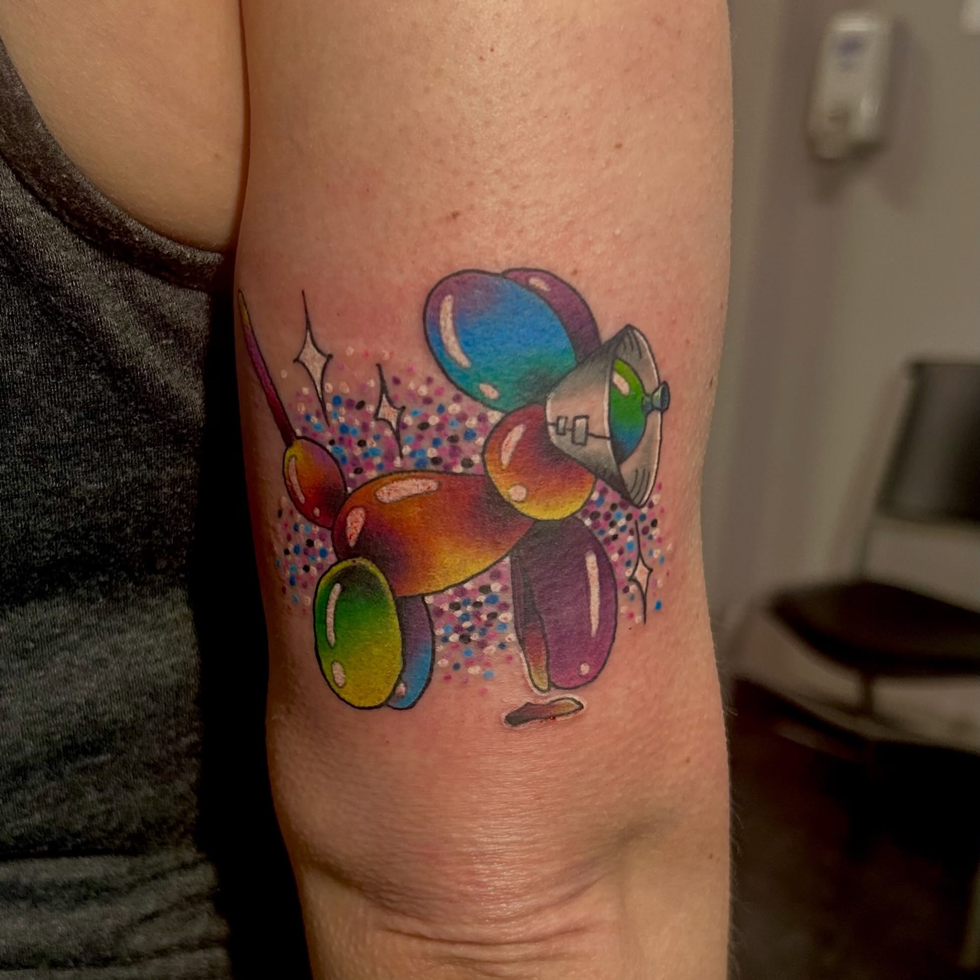 Balloon animal dotwork tattoo on the forearm by Jamie Winn