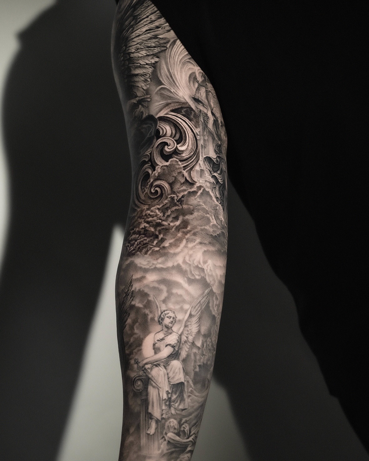 Angel with wings realism tattoo on the forearm by AMU
